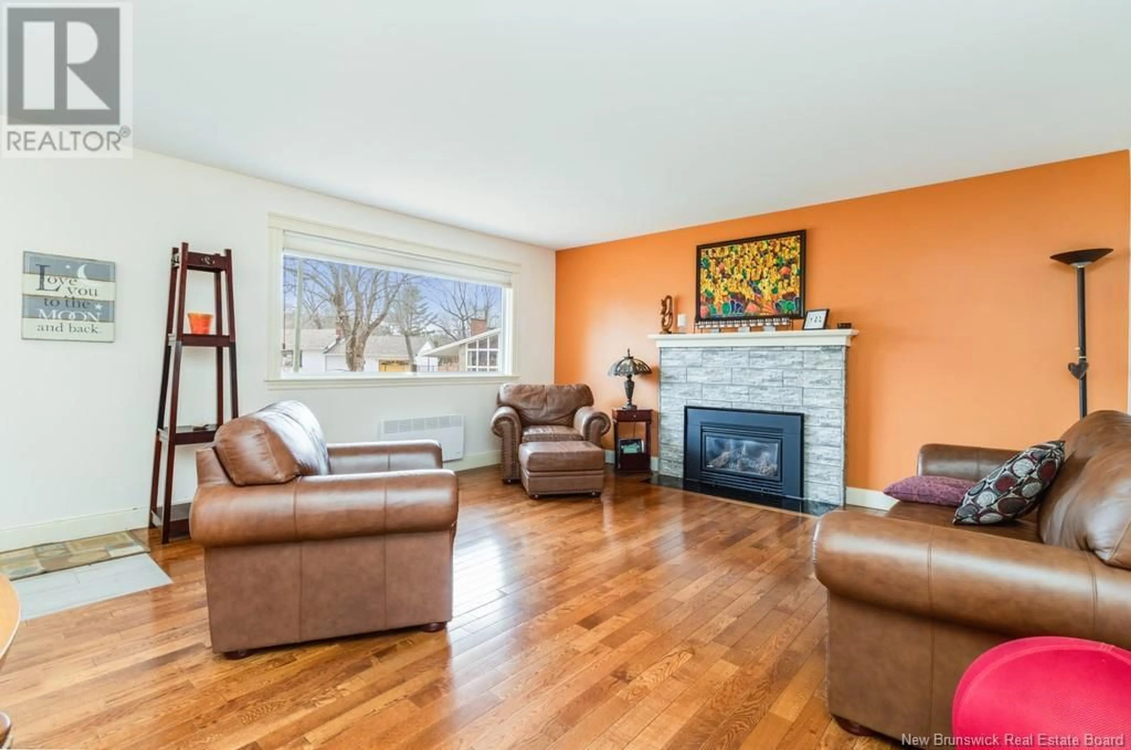 Living room with furniture, wood/laminate floor for 80 SHERWOOD COURT, Fredericton New Brunswick E3B2P5