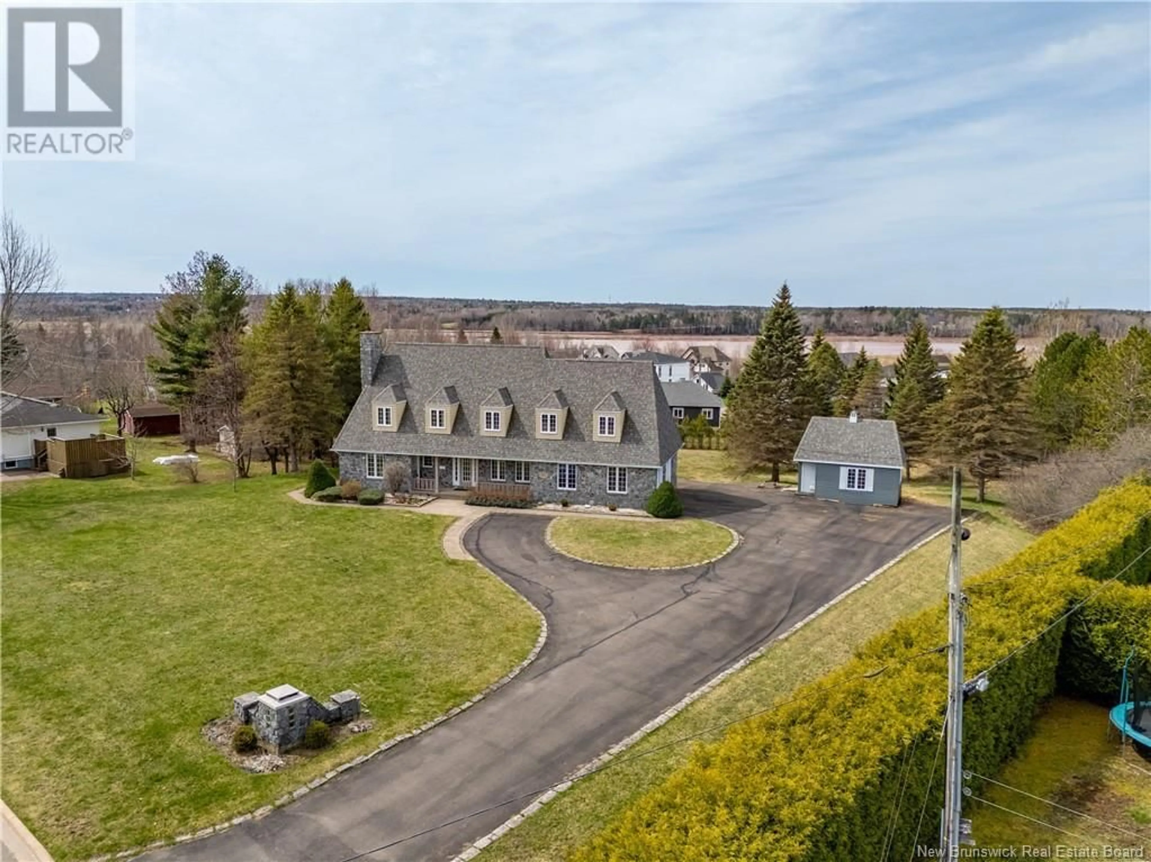 A pic from outside/outdoor area/front of a property/back of a property/a pic from drone, unknown for 45 BELLE AVENTURE, Dieppe New Brunswick E1A5G2