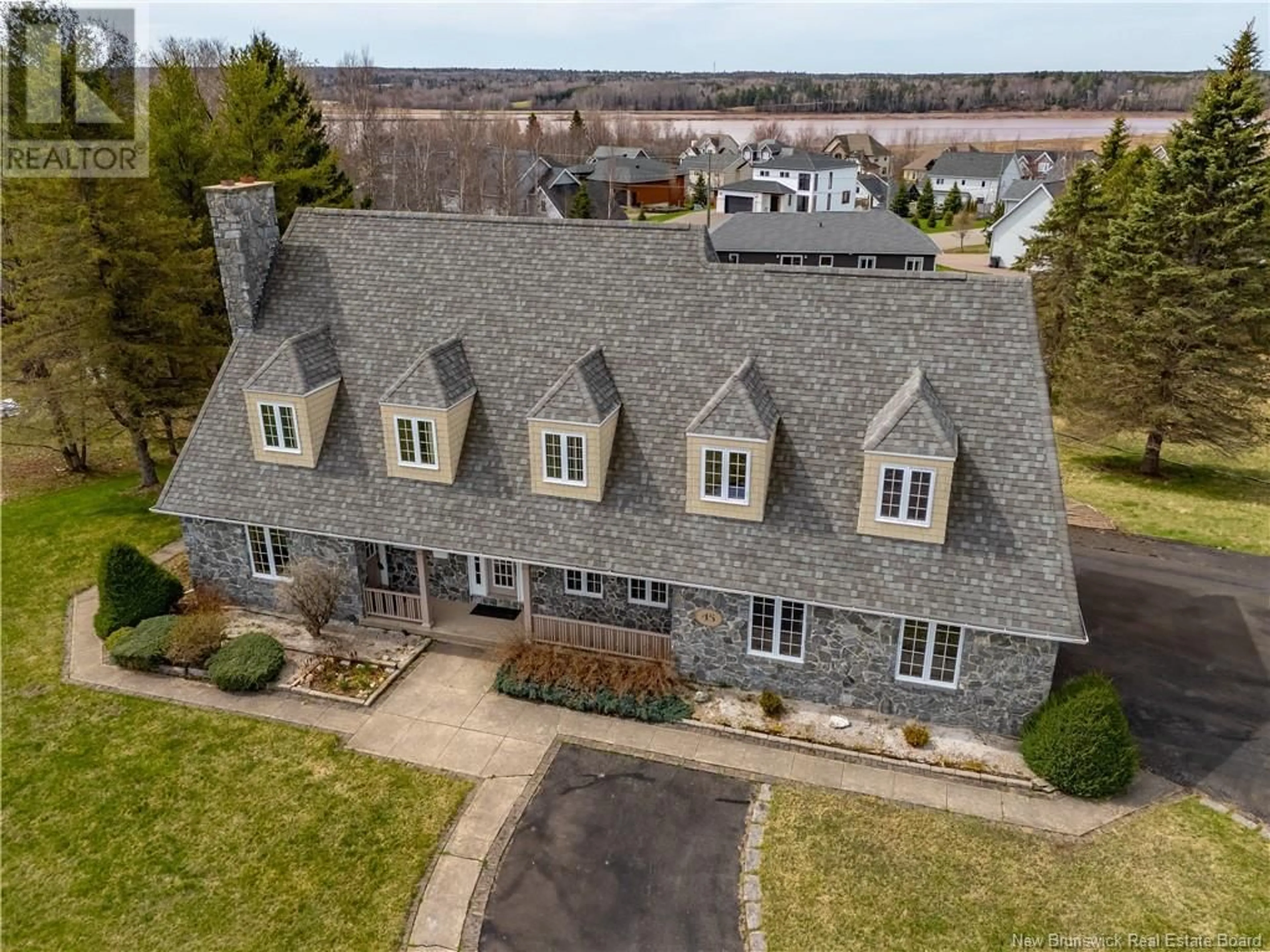 A pic from outside/outdoor area/front of a property/back of a property/a pic from drone, unknown for 45 BELLE AVENTURE, Dieppe New Brunswick E1A5G2