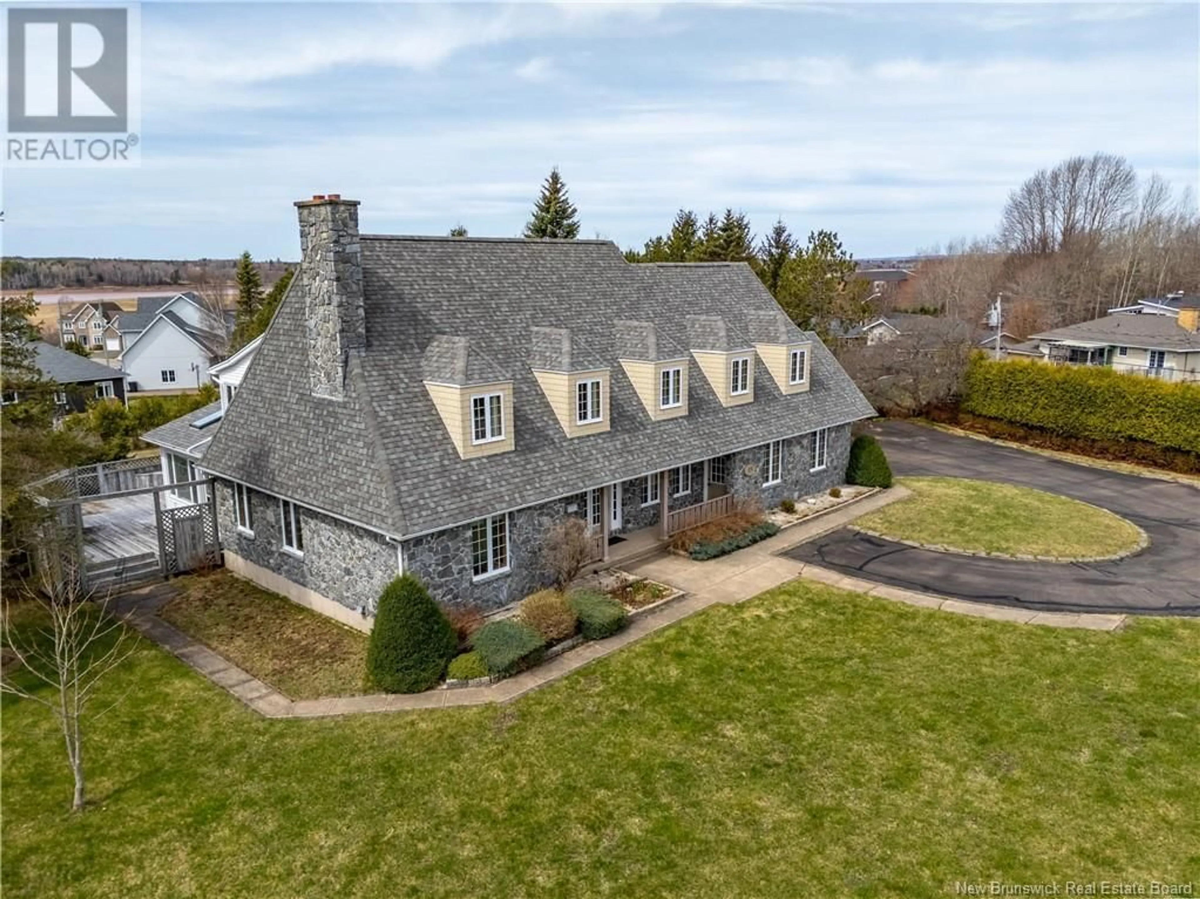 A pic from outside/outdoor area/front of a property/back of a property/a pic from drone, unknown for 45 BELLE AVENTURE, Dieppe New Brunswick E1A5G2
