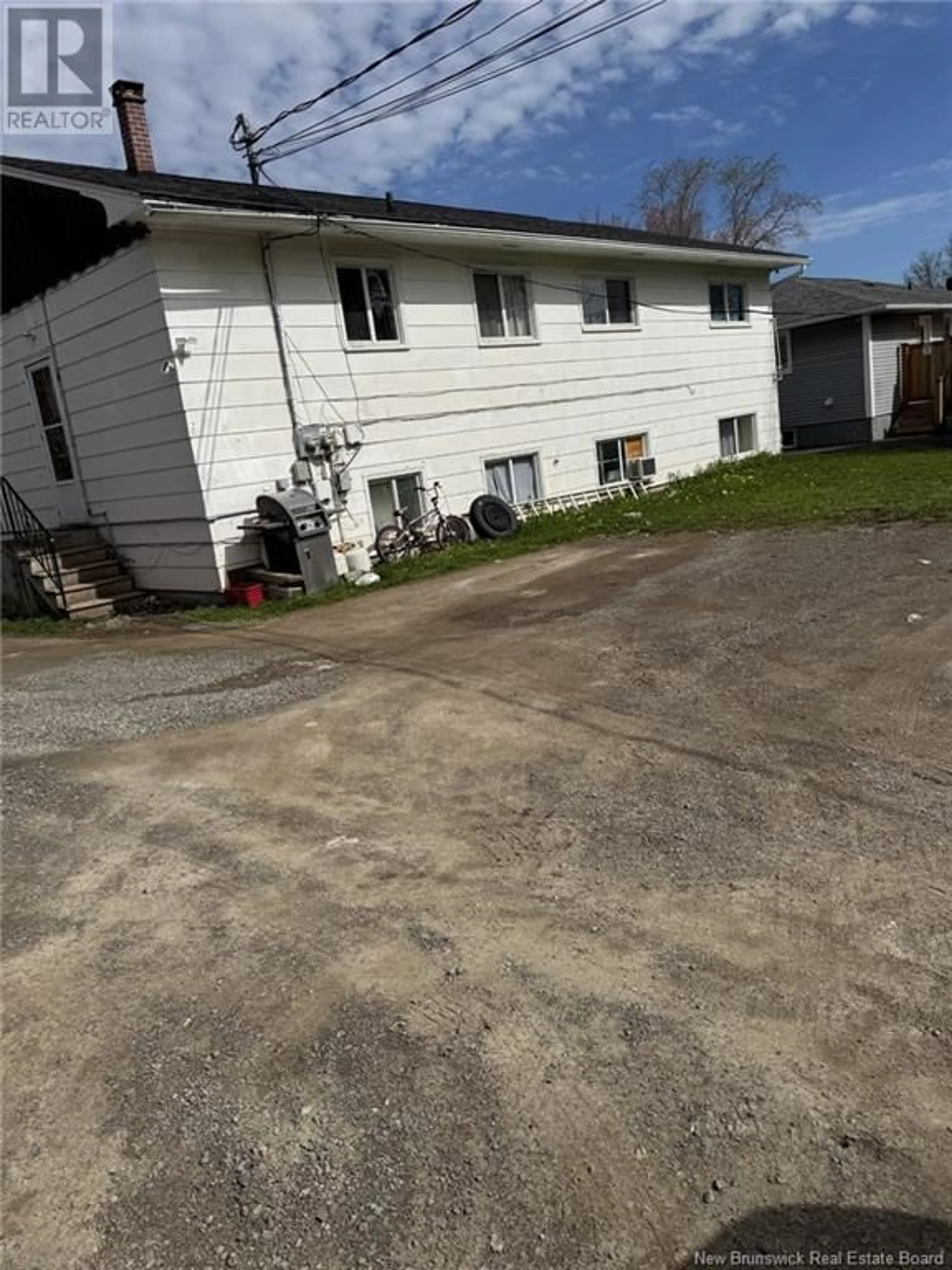 A pic from outside/outdoor area/front of a property/back of a property/a pic from drone, street for 33-35 CONVENTRY CRESCENT, Moncton New Brunswick E1C8G5