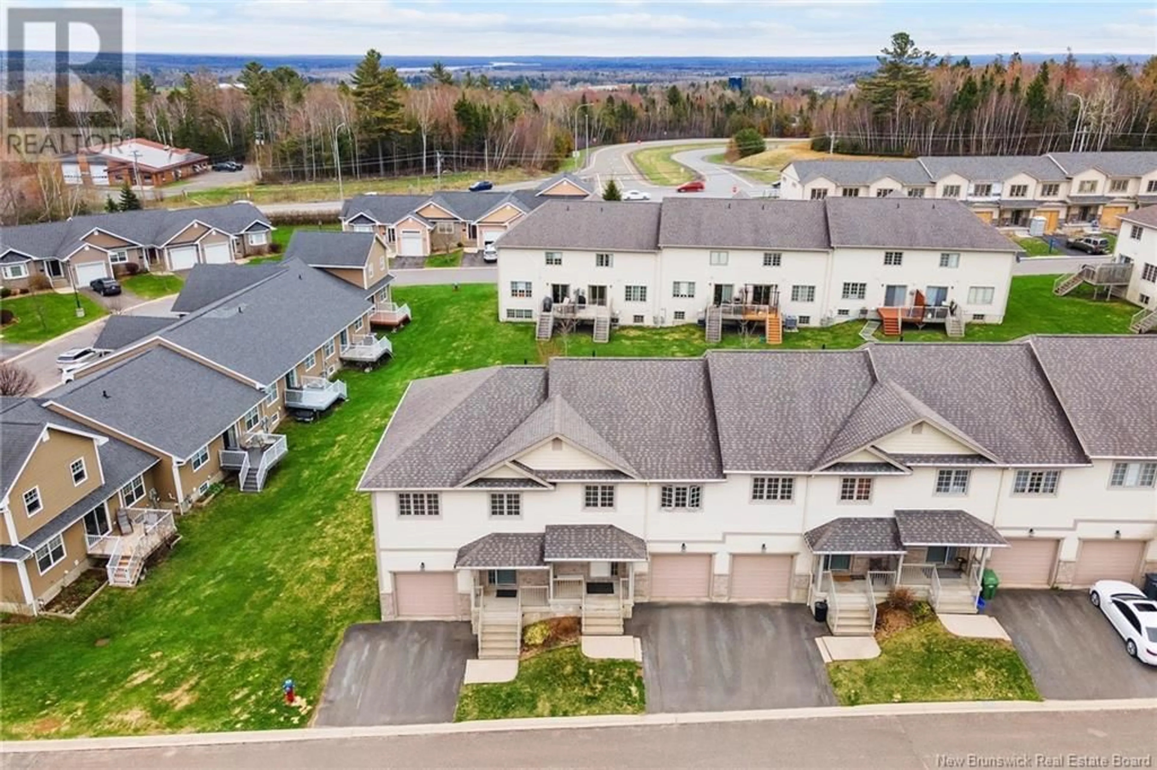 A pic from outside/outdoor area/front of a property/back of a property/a pic from drone, mountain view for 95 HUNTINGDON CIRCLE, Fredericton New Brunswick E3B0M1