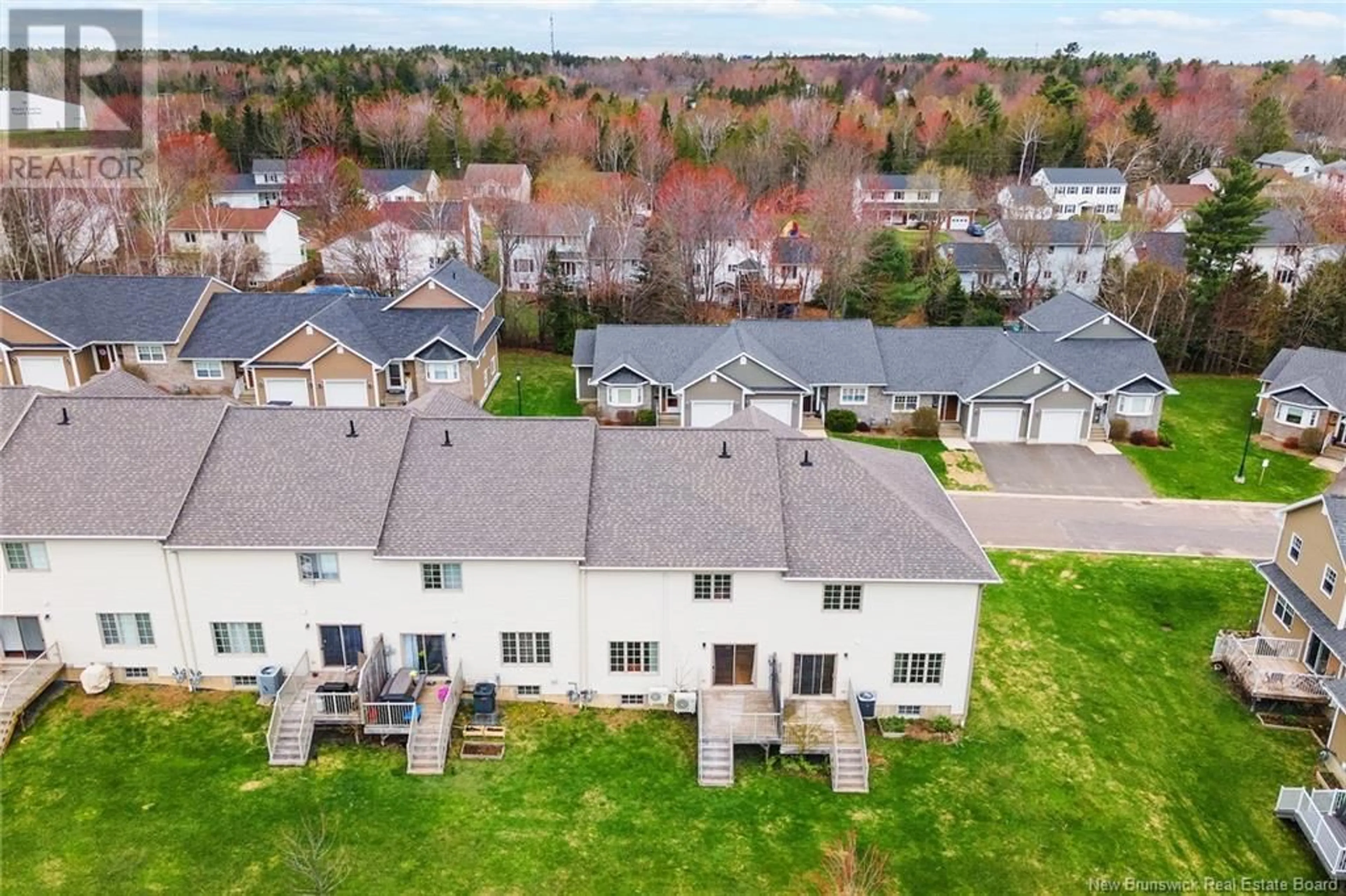 A pic from outside/outdoor area/front of a property/back of a property/a pic from drone, unknown for 95 HUNTINGDON CIRCLE, Fredericton New Brunswick E3B0M1