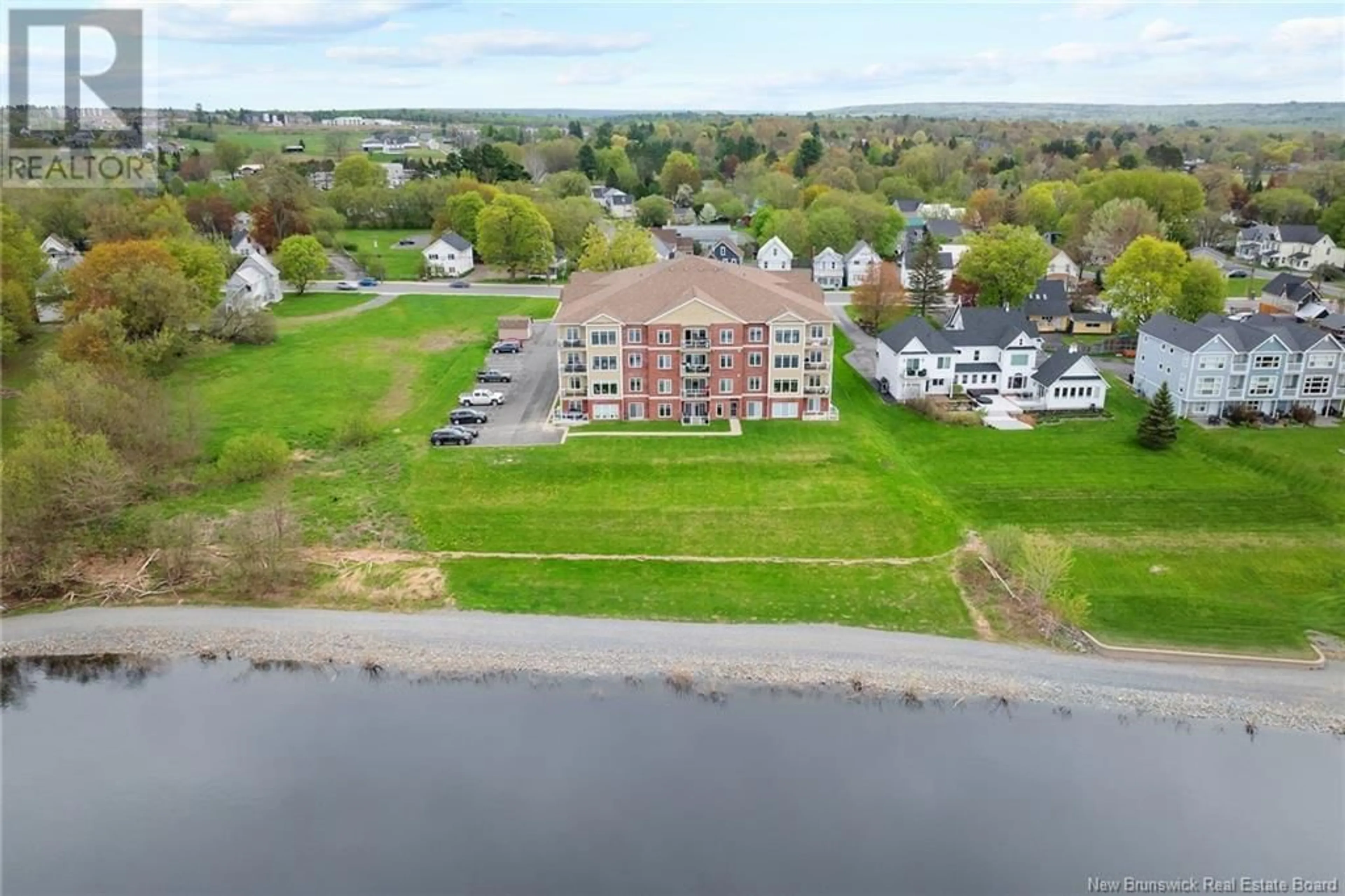 A pic from outside/outdoor area/front of a property/back of a property/a pic from drone, water/lake/river/ocean view for 303 - 700 UNION STREET, Fredericton New Brunswick E3A3N7