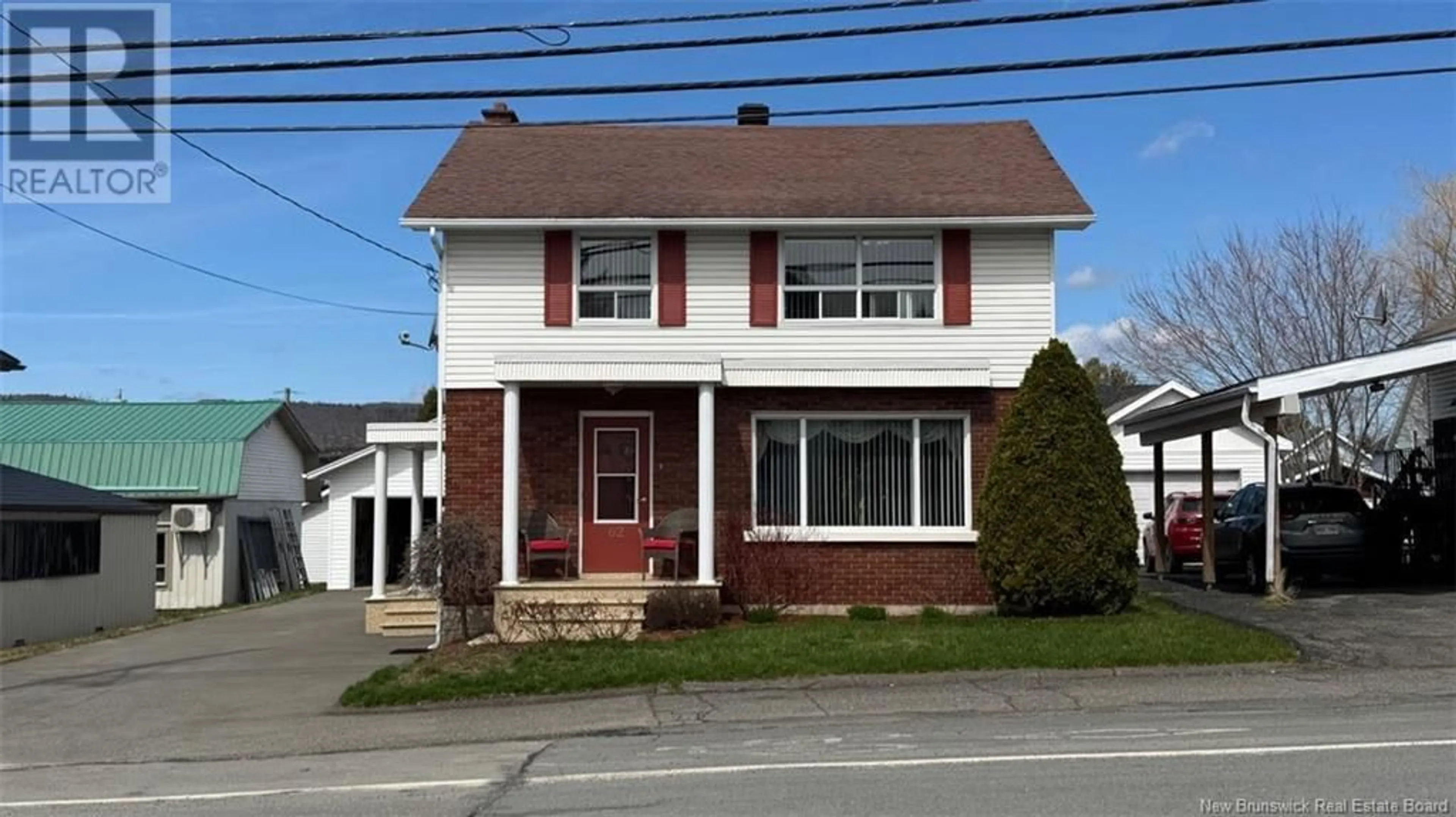 Home with vinyl exterior material, street for 62 POUVOIR STREET, Edmundston New Brunswick E3V2X8
