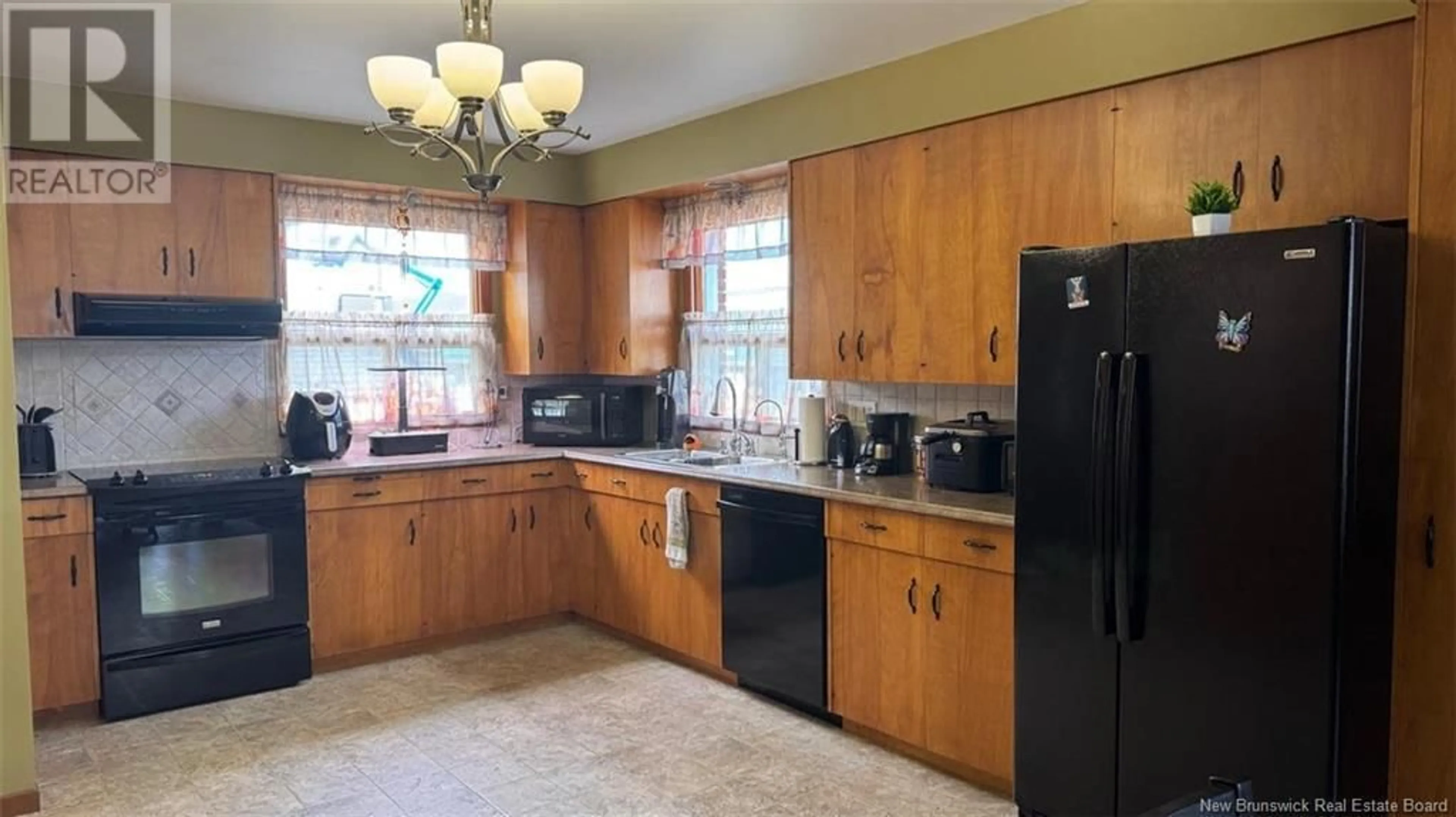 Standard kitchen, ceramic/tile floor for 62 POUVOIR STREET, Edmundston New Brunswick E3V2X8