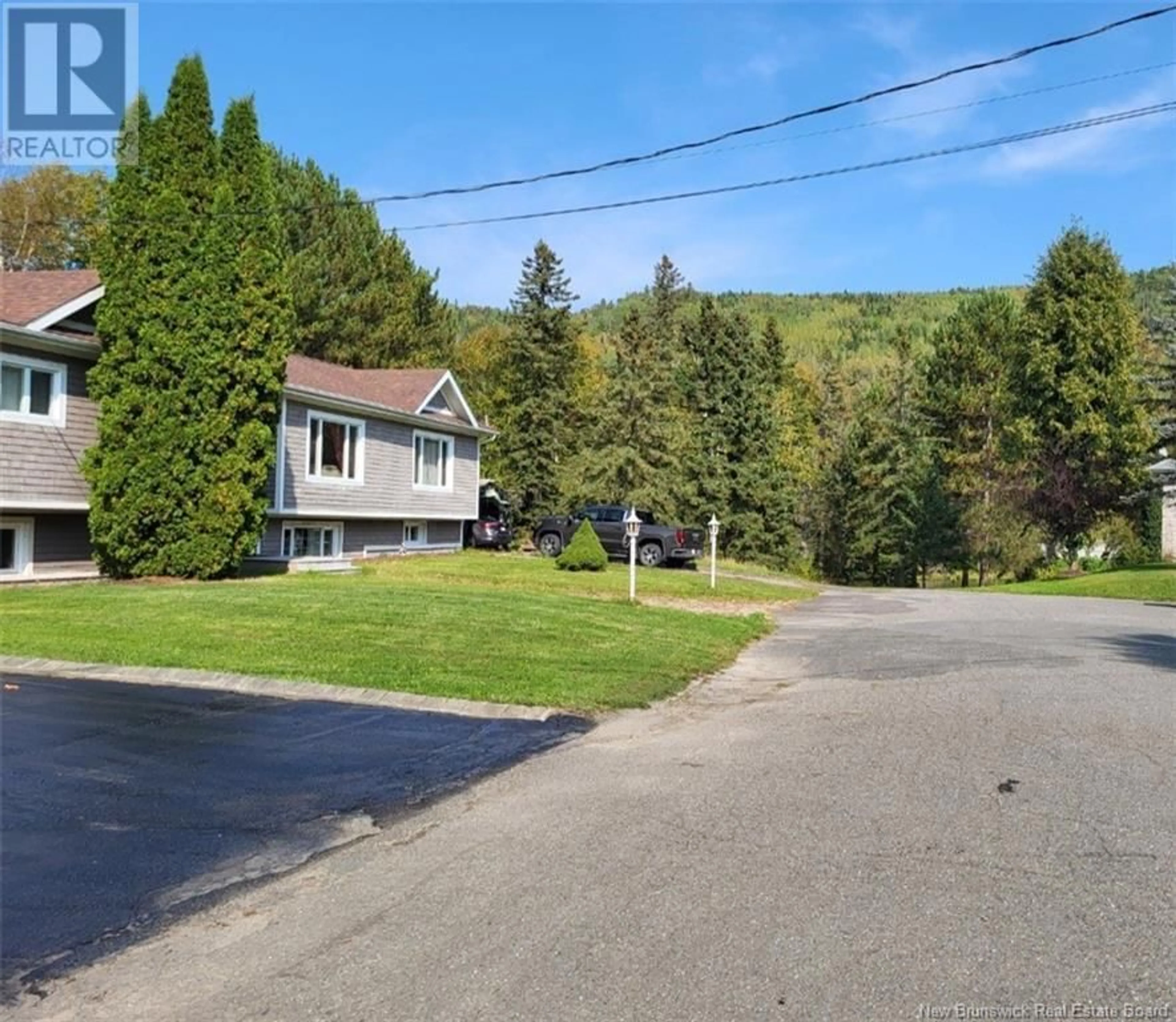 A pic from outside/outdoor area/front of a property/back of a property/a pic from drone, street for 35 DES DRAVEURS AVENUE, Saint-Jacques New Brunswick E7B1J4