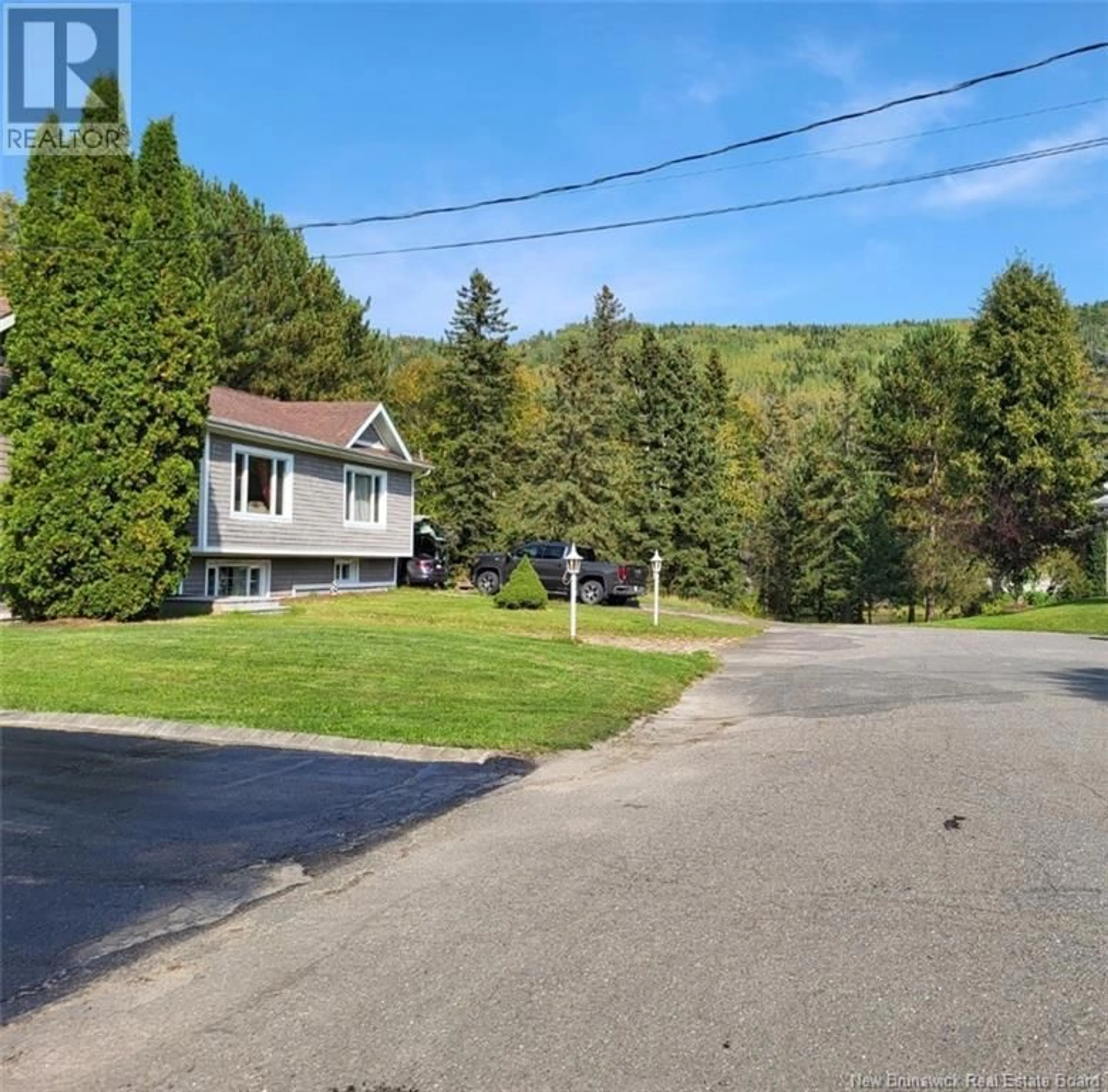 A pic from outside/outdoor area/front of a property/back of a property/a pic from drone, unknown for 35 DES DRAVEURS AVENUE, Saint-Jacques New Brunswick E7B1J4