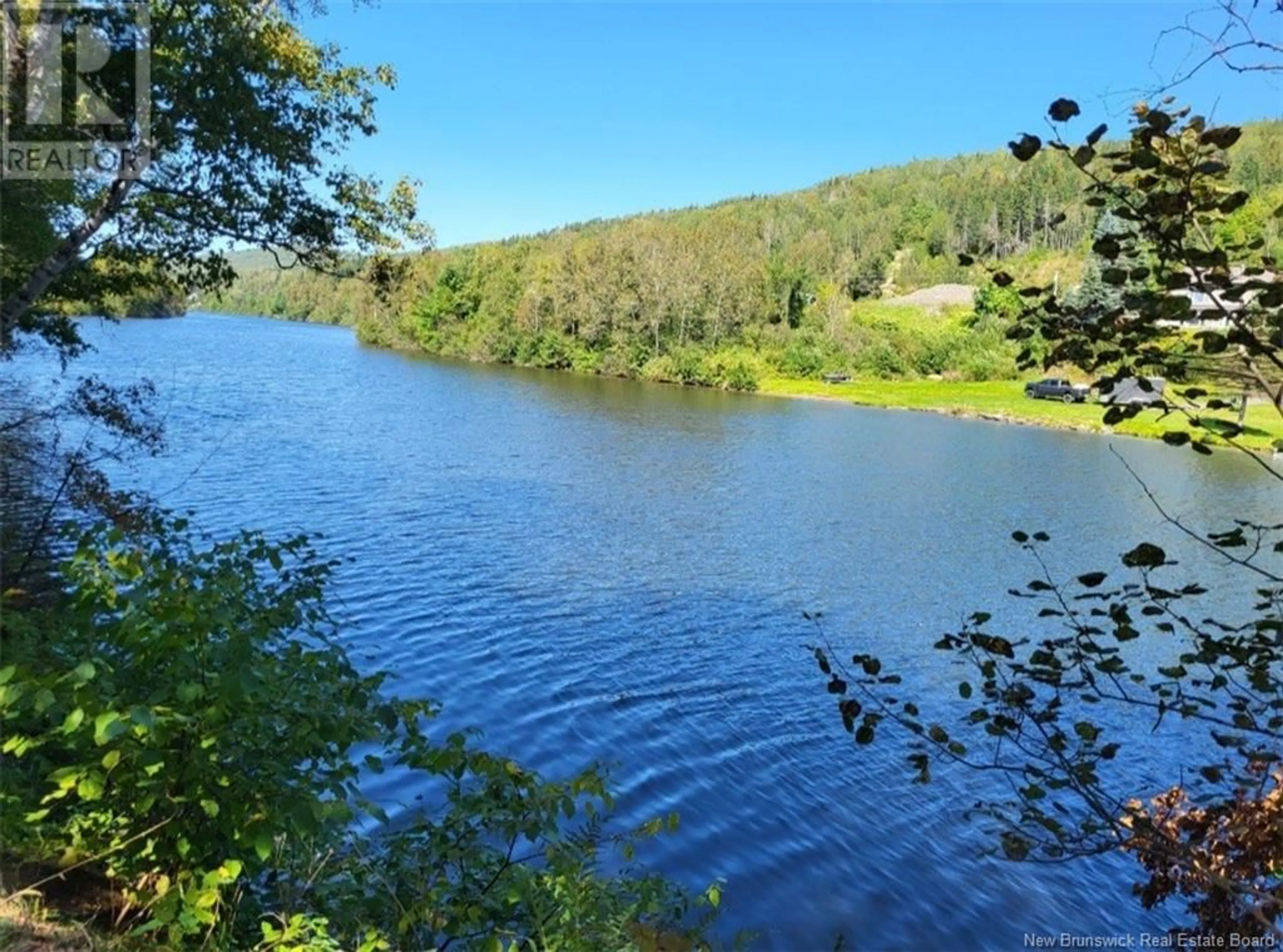A pic from outside/outdoor area/front of a property/back of a property/a pic from drone, water/lake/river/ocean view for 35 DES DRAVEURS AVENUE, Saint-Jacques New Brunswick E7B1J4