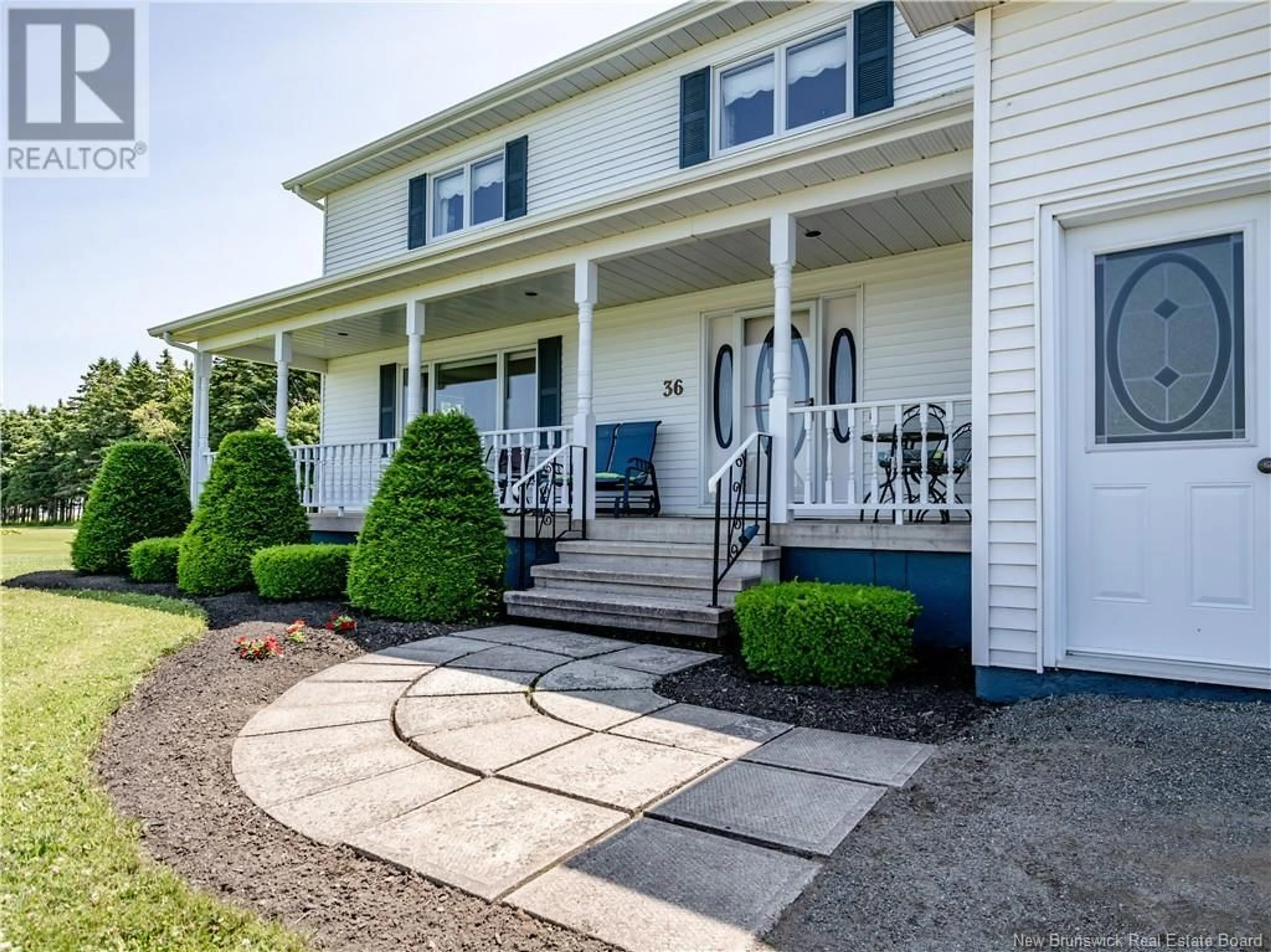 Home with vinyl exterior material, street for 36 ACADIE, Bouctouche New Brunswick E4S2T2