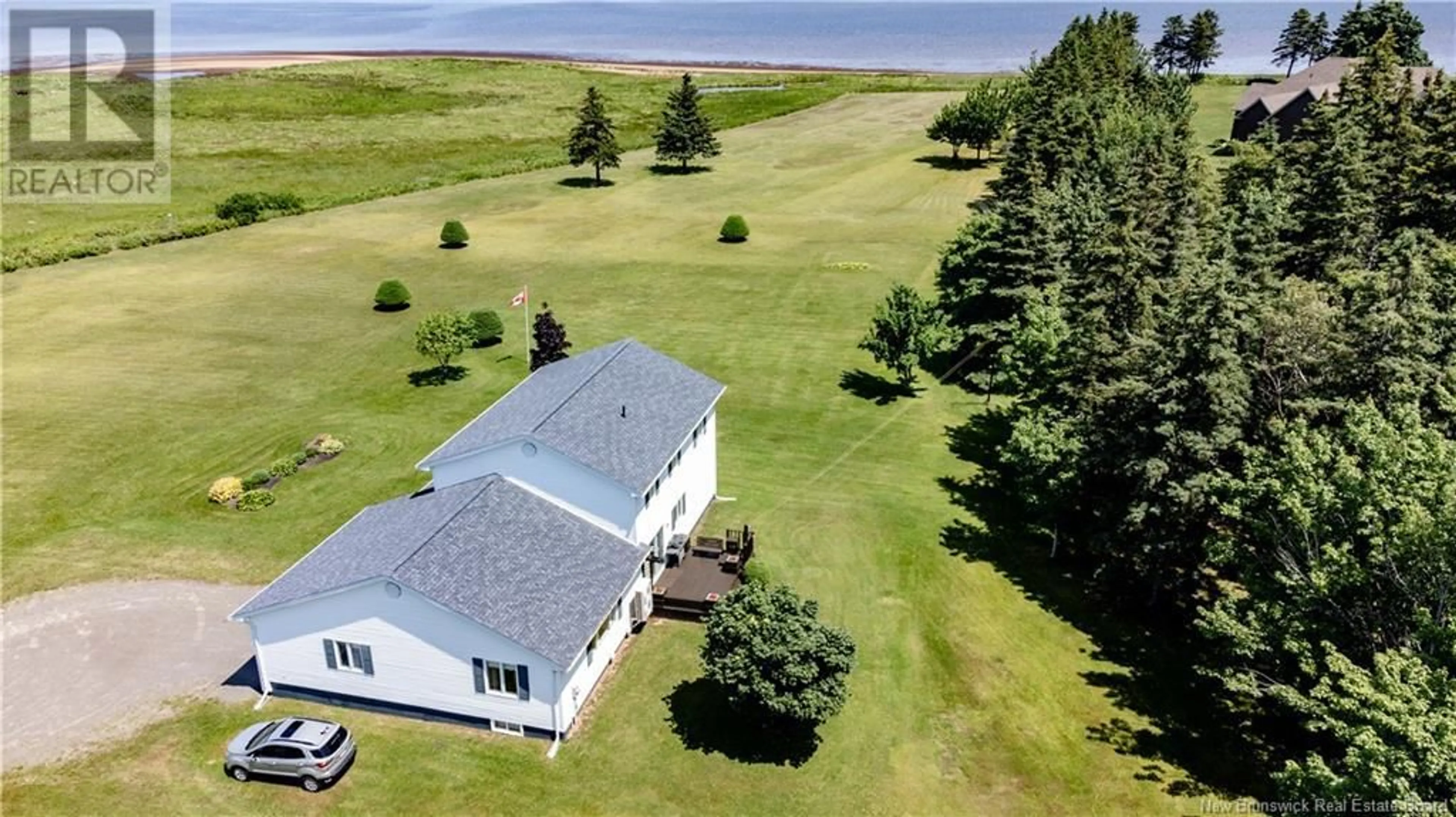 A pic from outside/outdoor area/front of a property/back of a property/a pic from drone, water/lake/river/ocean view for 36 ACADIE, Bouctouche New Brunswick E4S2T2