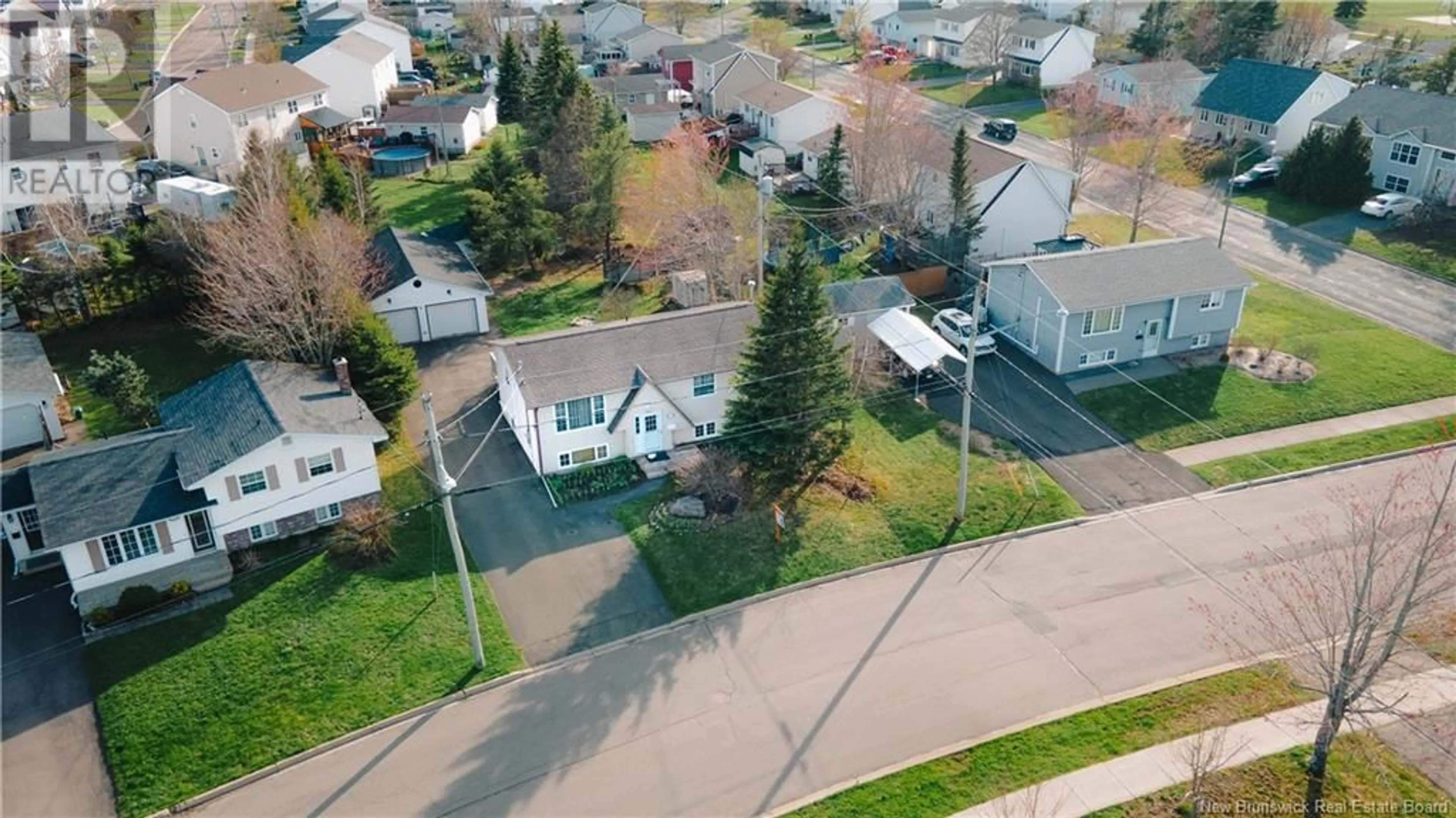 A pic from outside/outdoor area/front of a property/back of a property/a pic from drone, street for 158 LOGAN LANE, Moncton New Brunswick E1G1N5