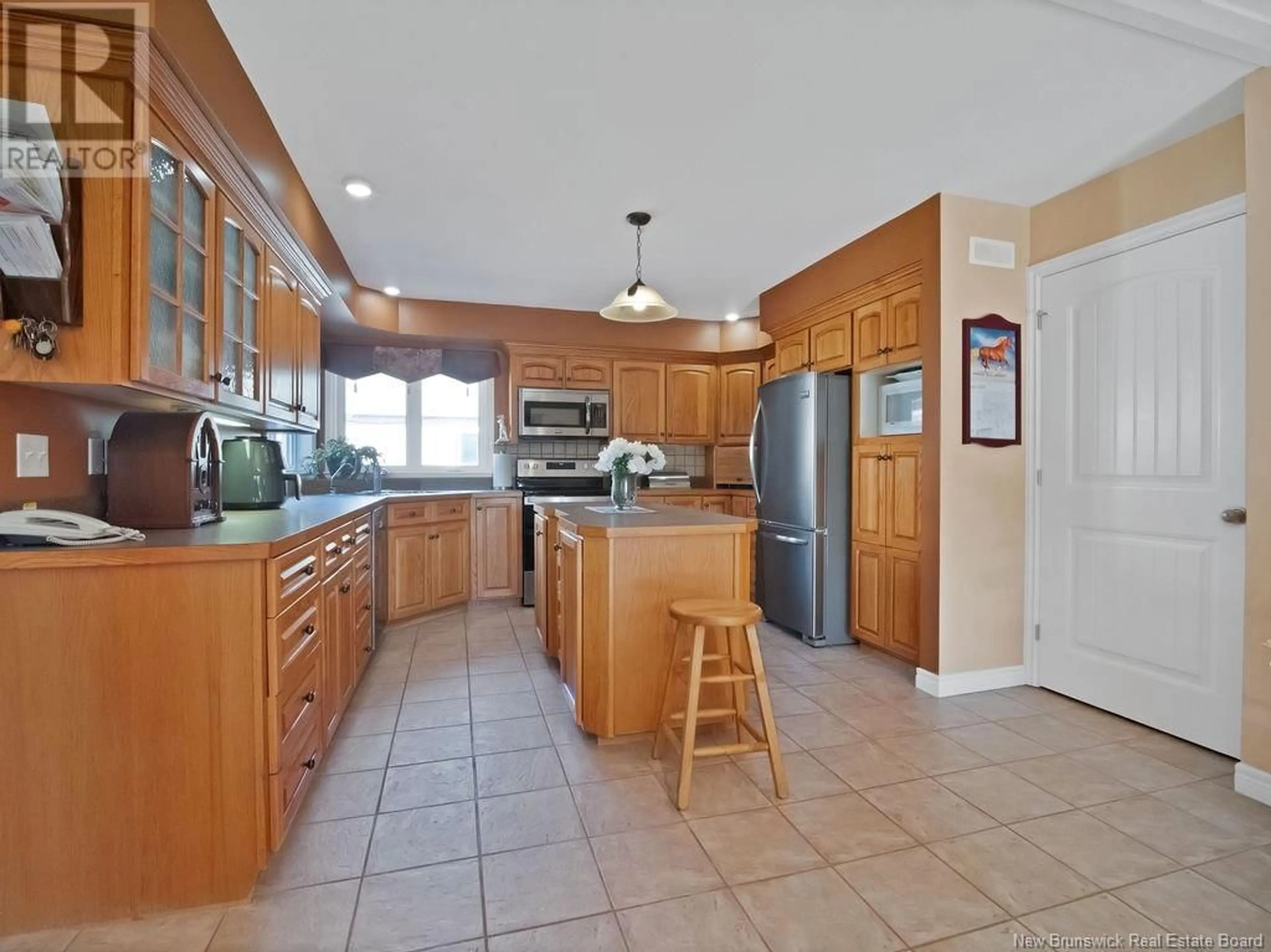 Open concept kitchen, ceramic/tile floor for 2063 RTE 910, Turtle Creek New Brunswick E1J2G4