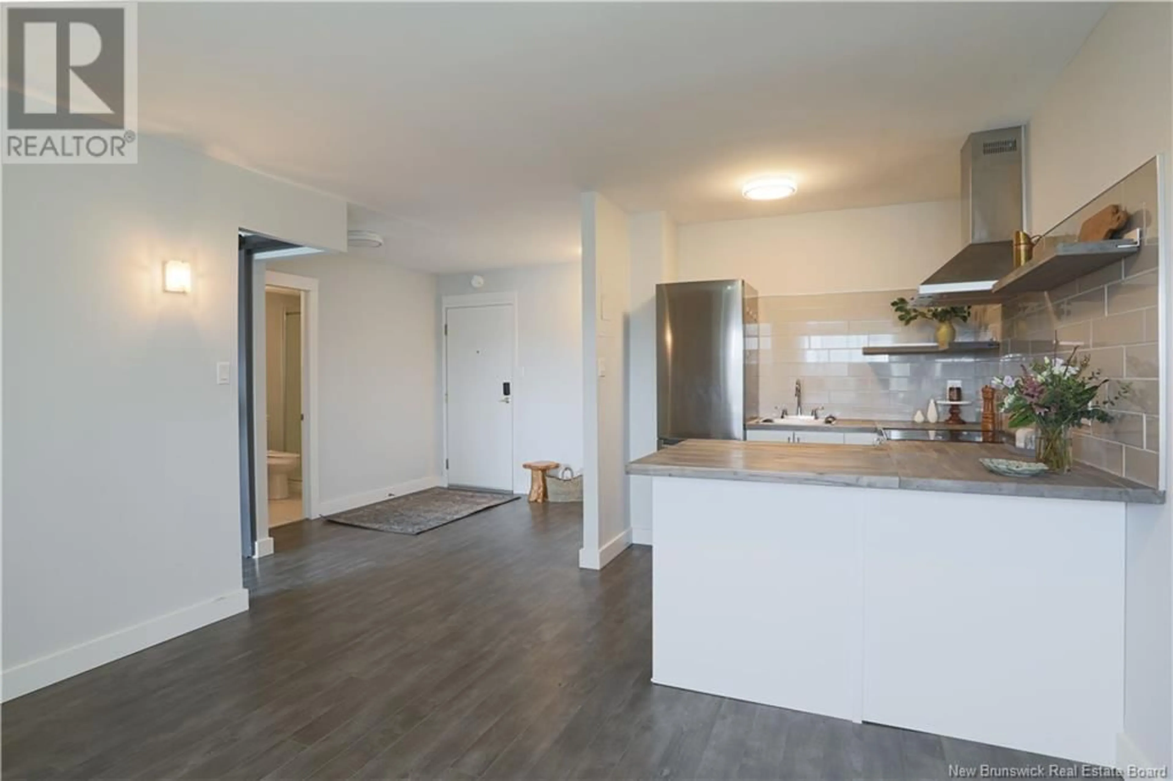 Open concept kitchen, wood/laminate floor for 1008 - 310 WOODWARD AVENUE, Saint John New Brunswick E2K2L1