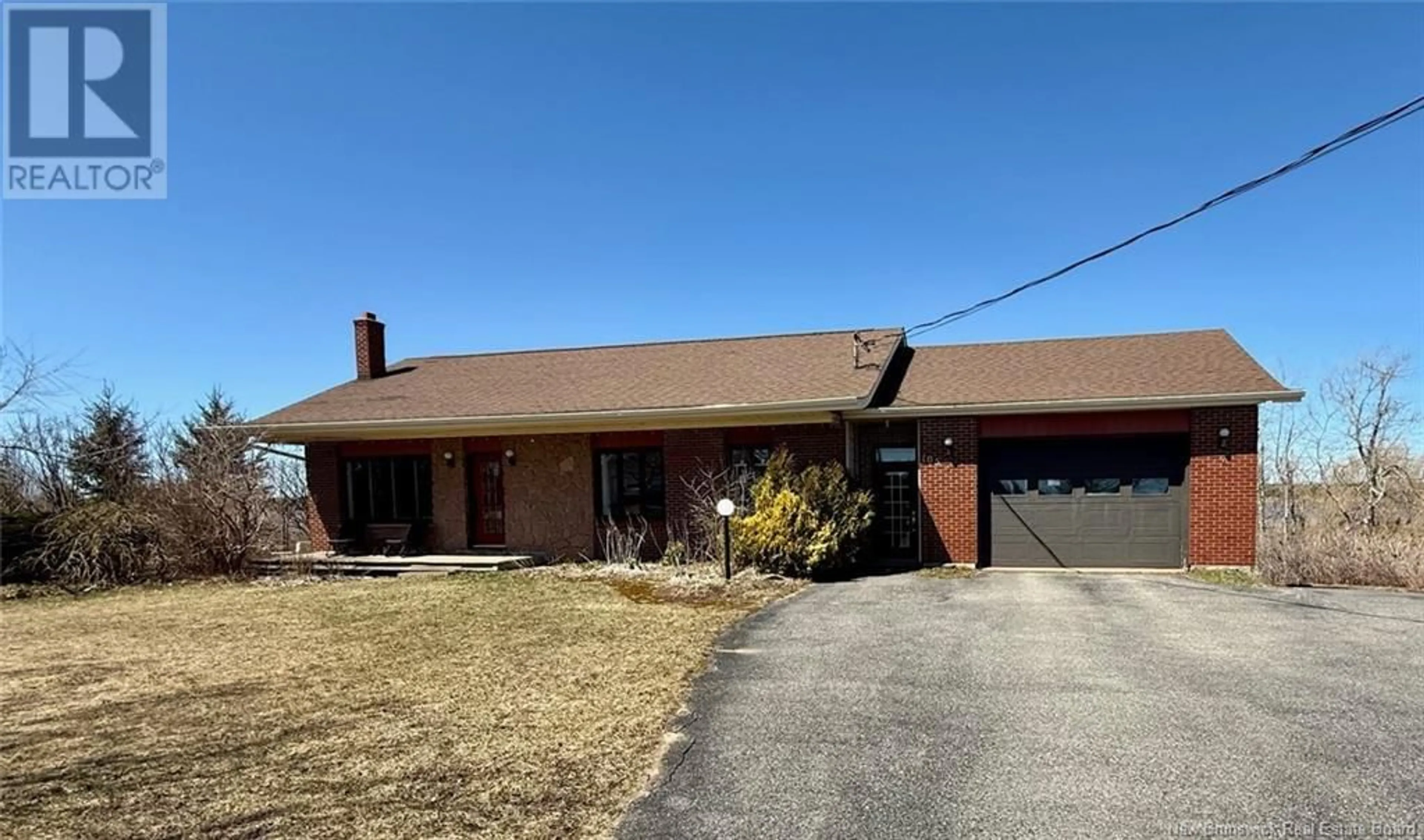 Home with brick exterior material, street for 105 ROUTE 305, Haut-Lamèque New Brunswick E8T3M1