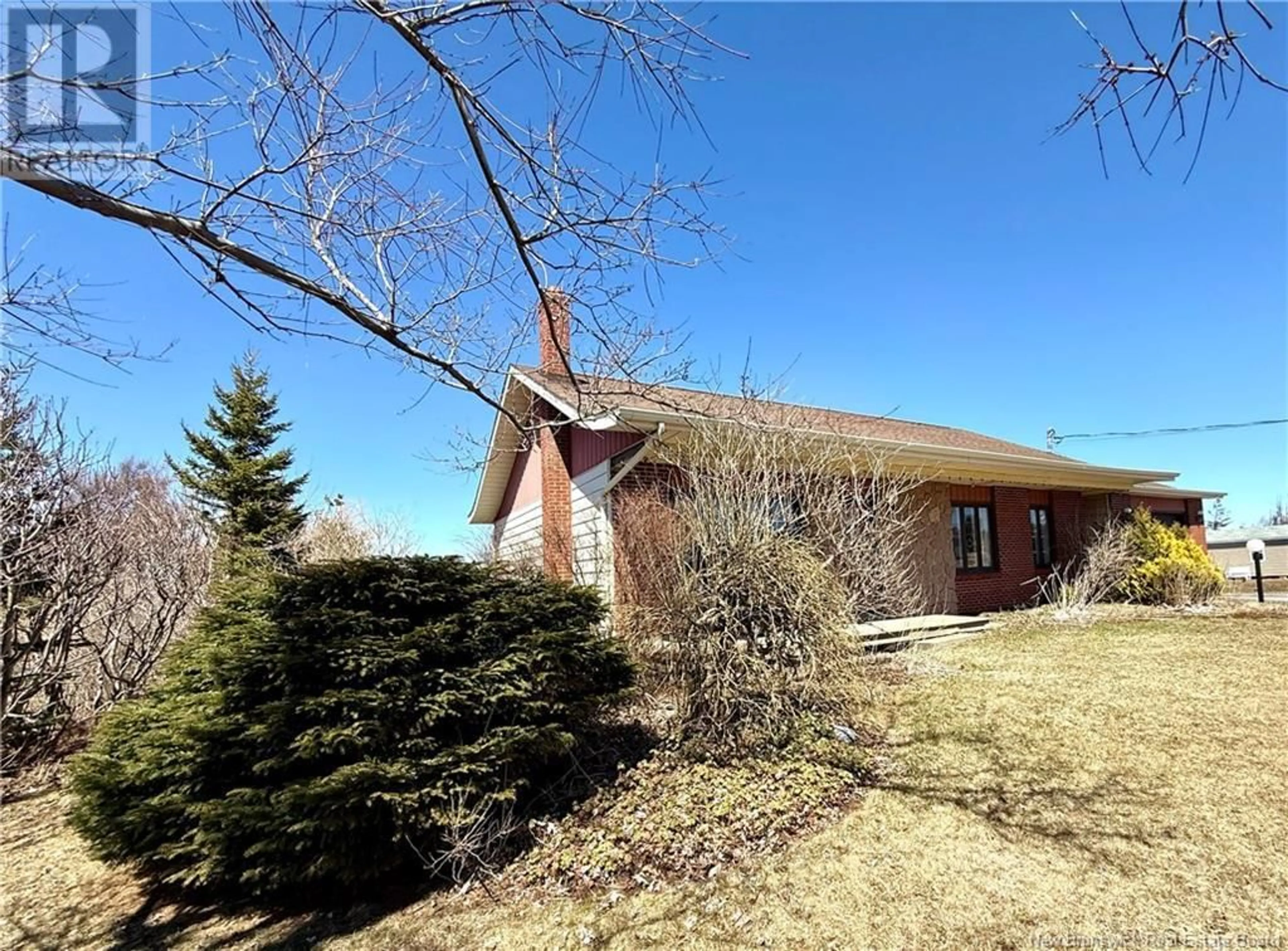 Home with brick exterior material, street for 105 ROUTE 305, Haut-Lamèque New Brunswick E8T3M1