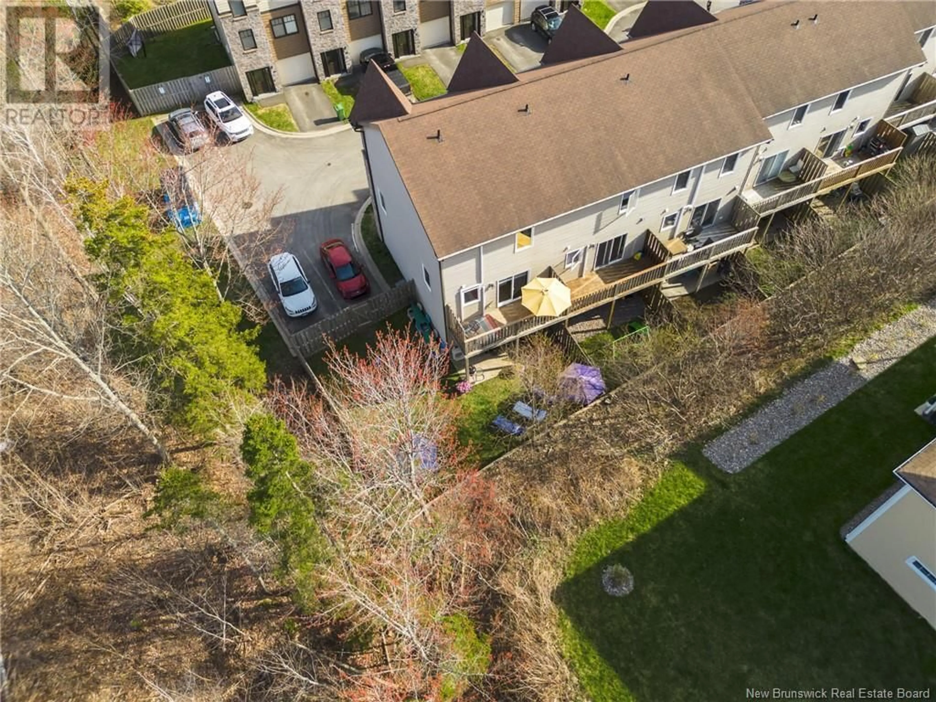 A pic from outside/outdoor area/front of a property/back of a property/a pic from drone, city buildings view from balcony for 59 BROWNSTONE LANE, Fredericton New Brunswick E3A7M4