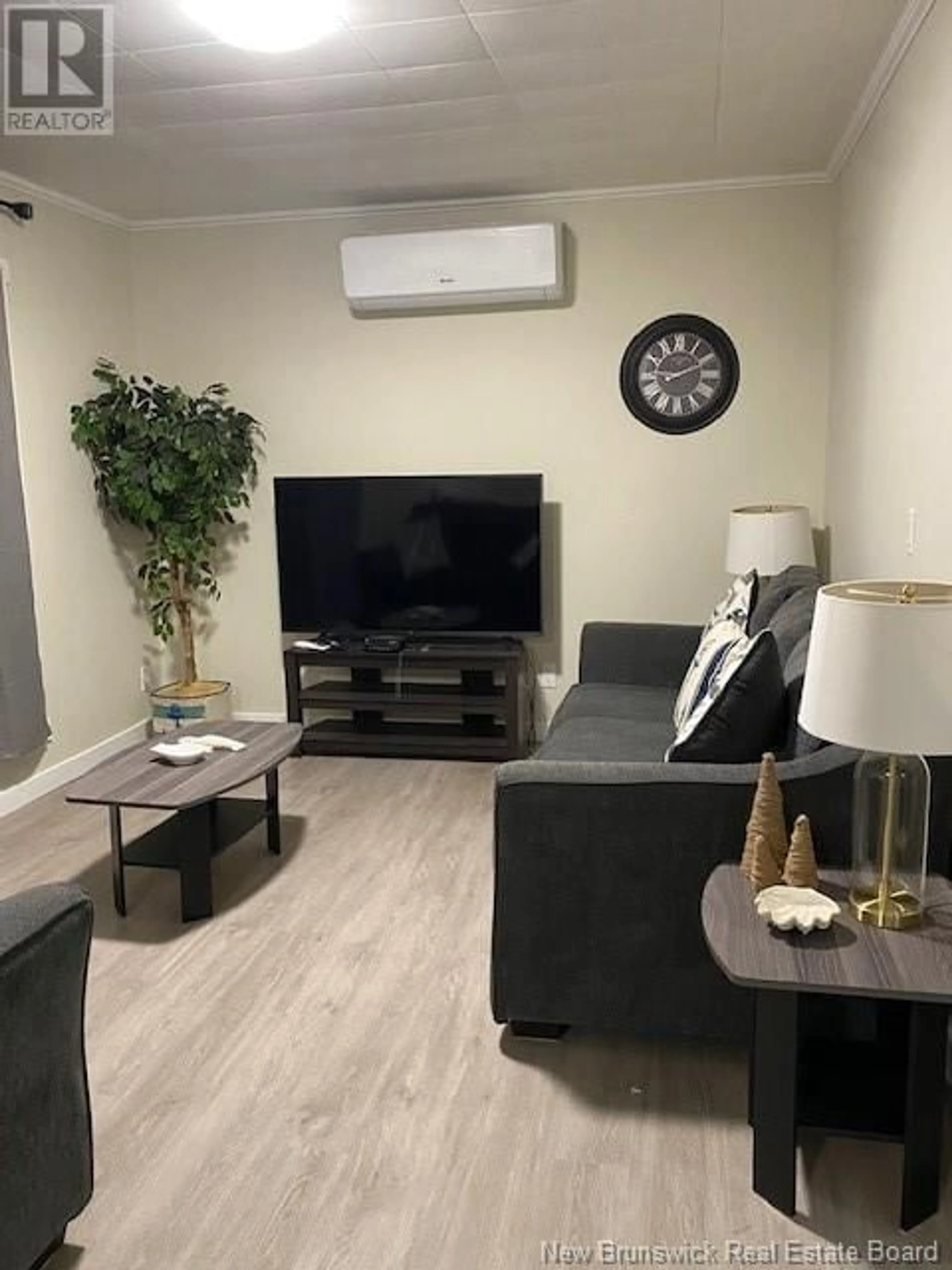 Living room with furniture, wood/laminate floor for 521 WELLINGTON ROAD, Blacks Harbour New Brunswick E5H1C7