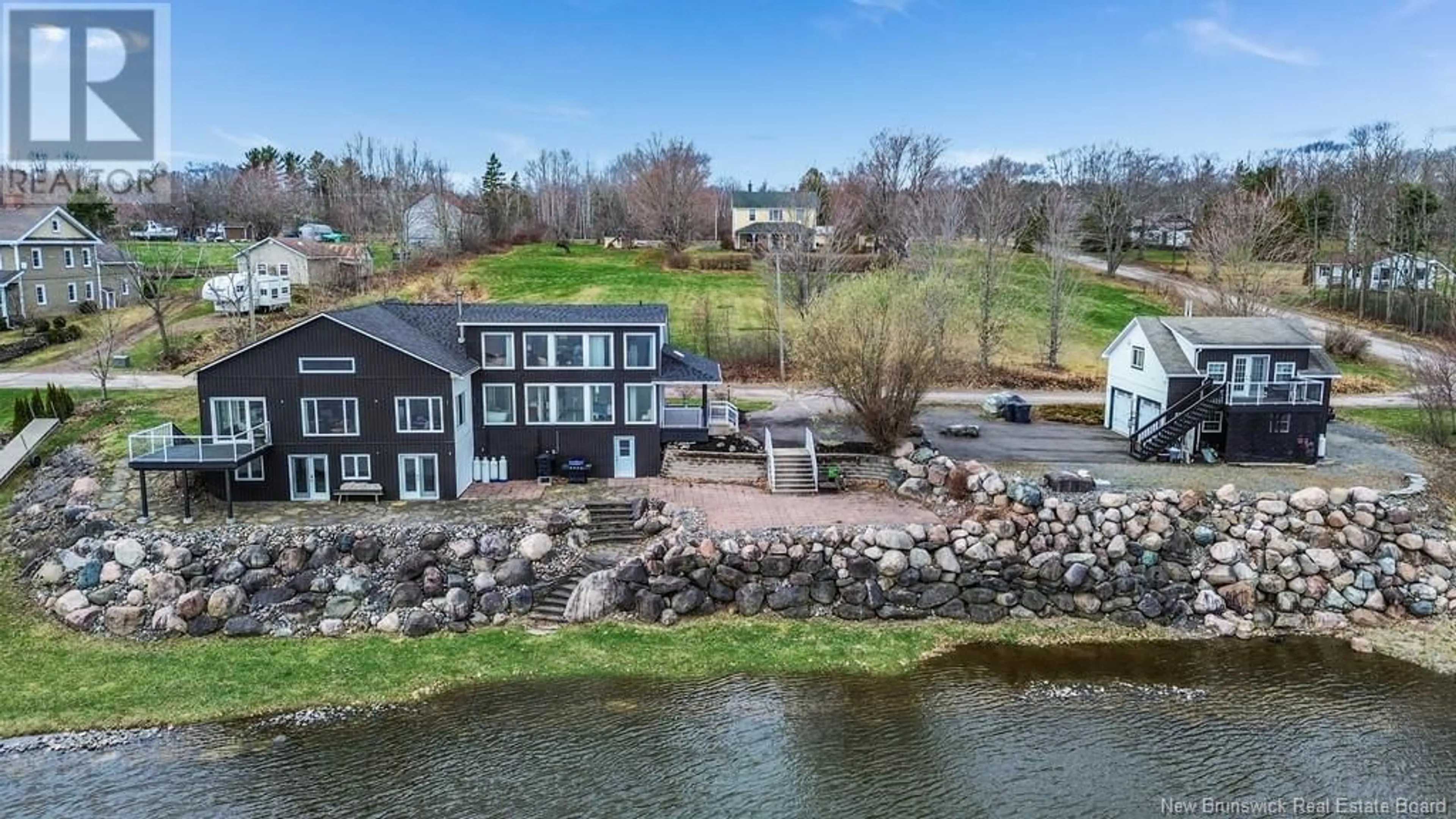 A pic from outside/outdoor area/front of a property/back of a property/a pic from drone, water/lake/river/ocean view for 92 FRONT STREET, Gagetown New Brunswick E5M1A1
