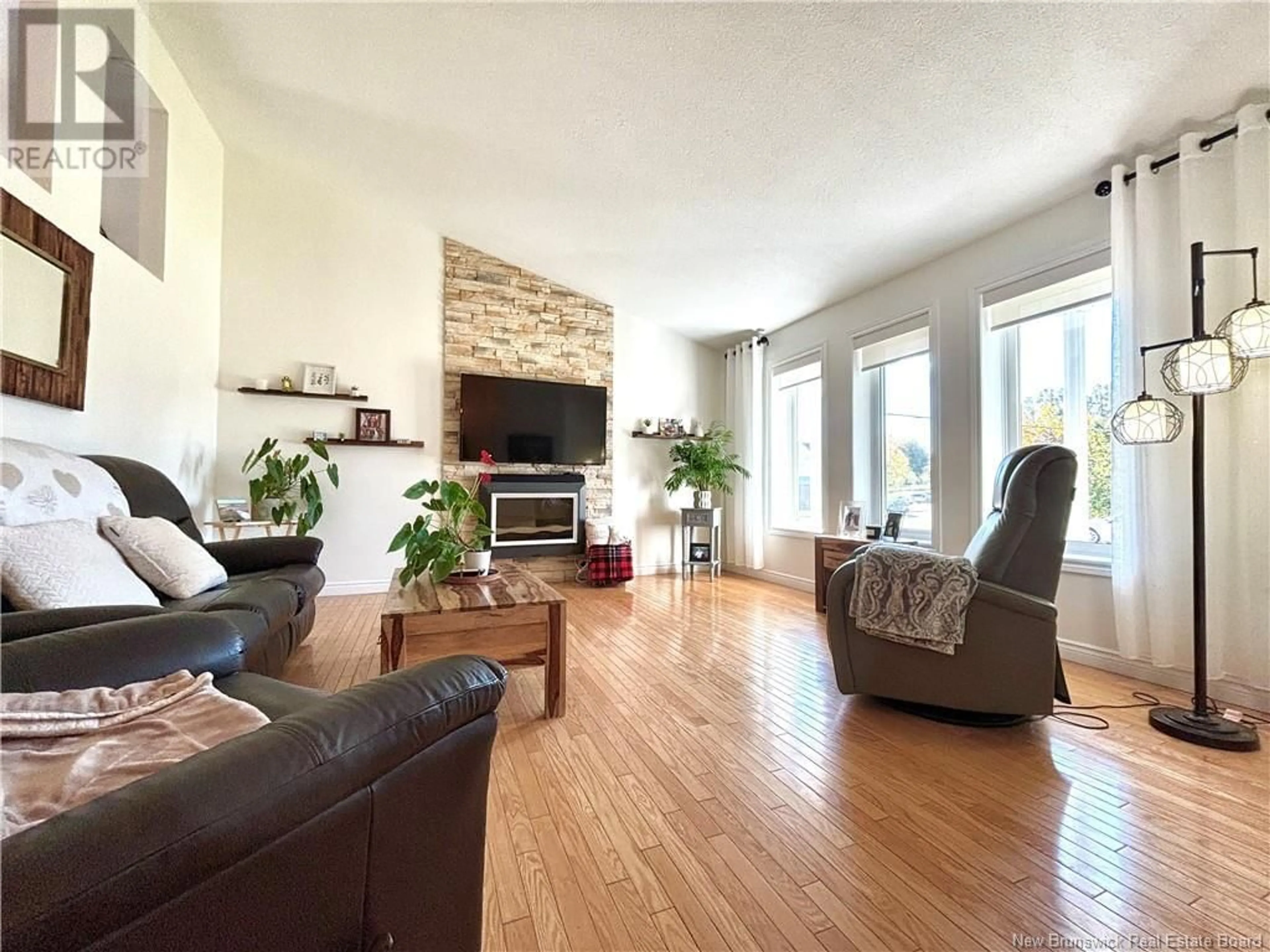 Living room with furniture, wood/laminate floor for 1304 ST JOSEPH, Bathurst New Brunswick E2A3R5