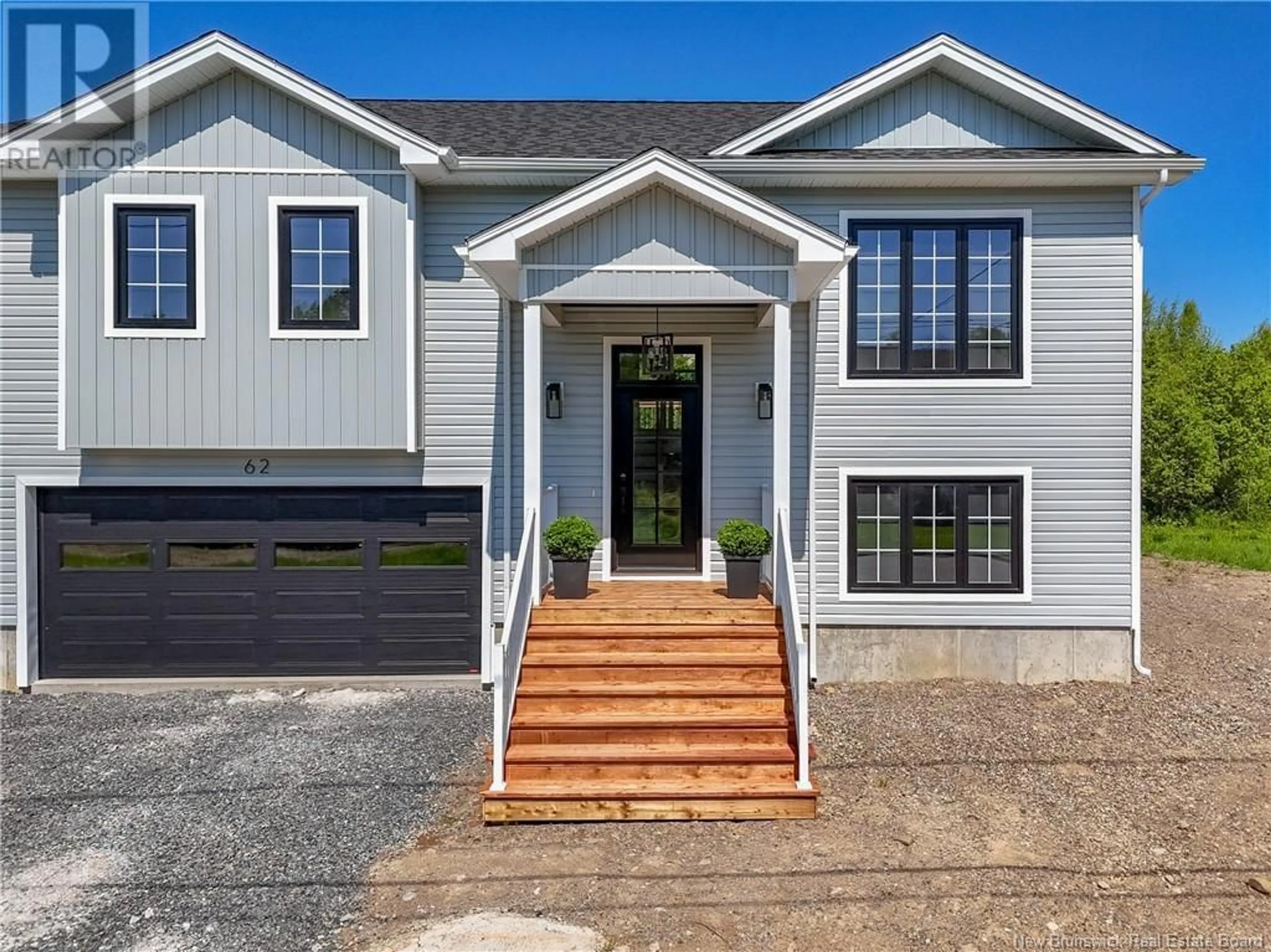 Home with vinyl exterior material, street for 62 MALIBU STREET, Fredericton New Brunswick E3A5P9