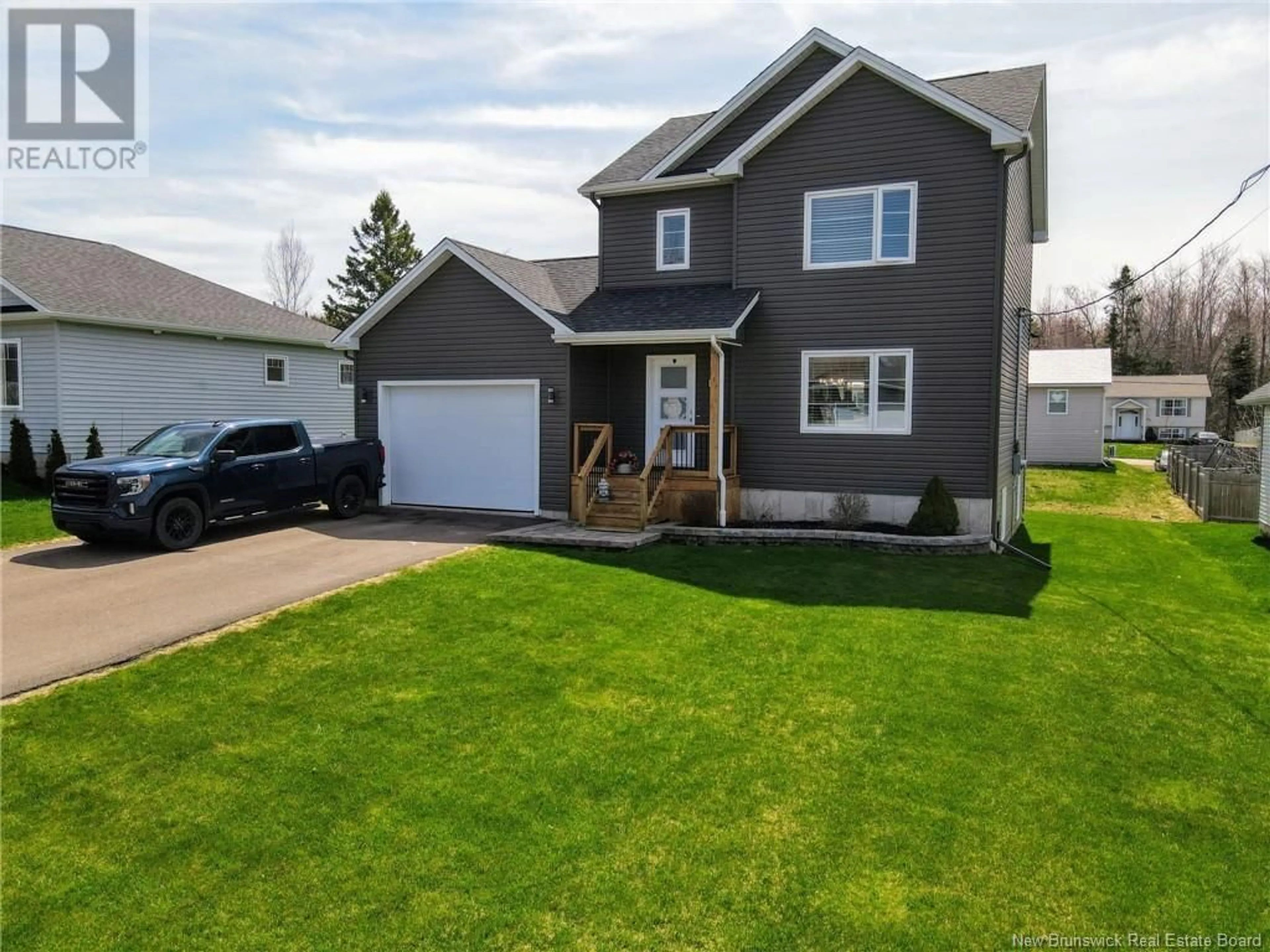 Home with vinyl exterior material, street for 127 DOIRON ROAD, Dieppe New Brunswick E1A0X9