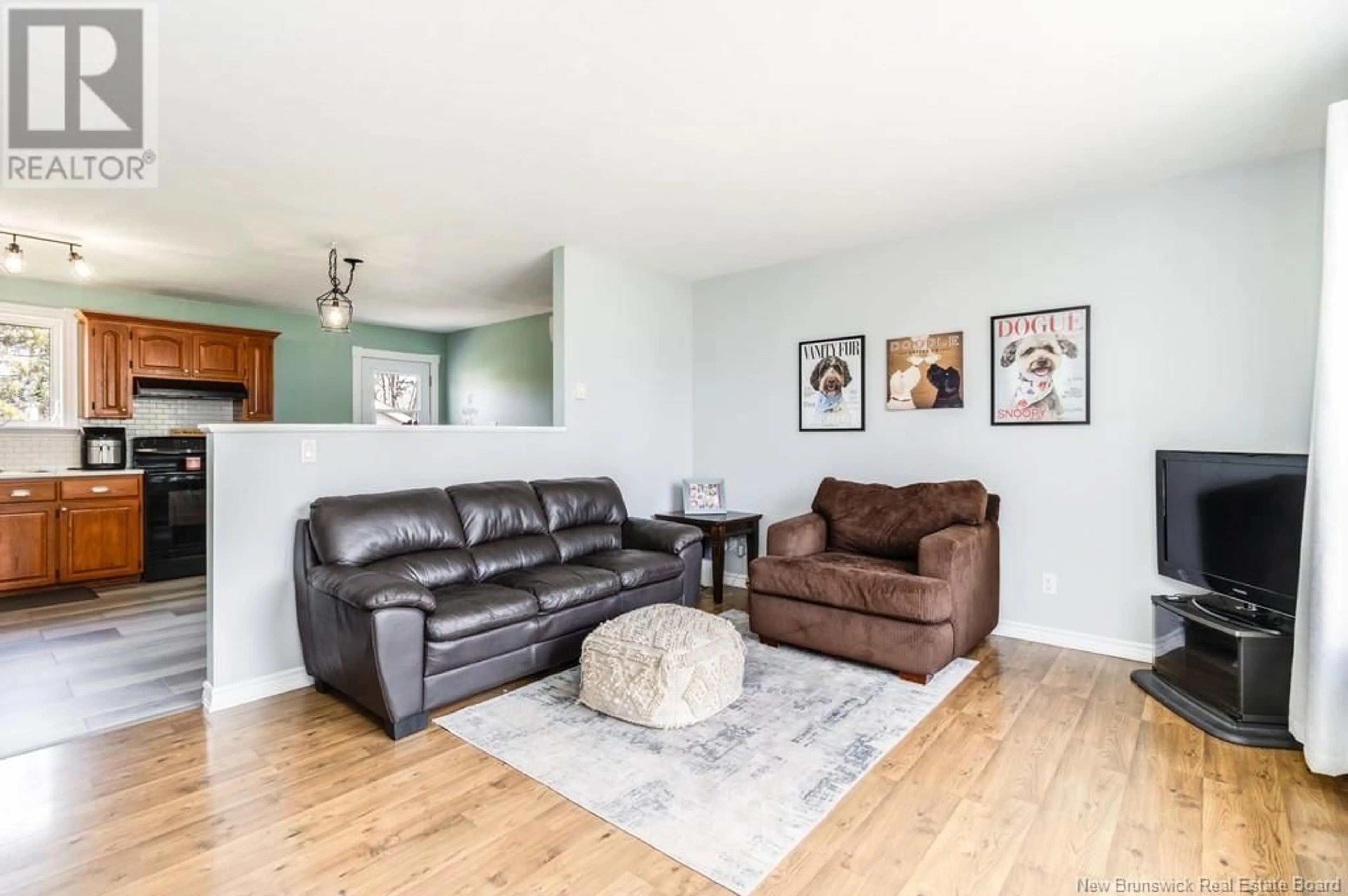 Living room with furniture, wood/laminate floor for 81 FINNAMORE STREET, Oromocto New Brunswick E2V2K3