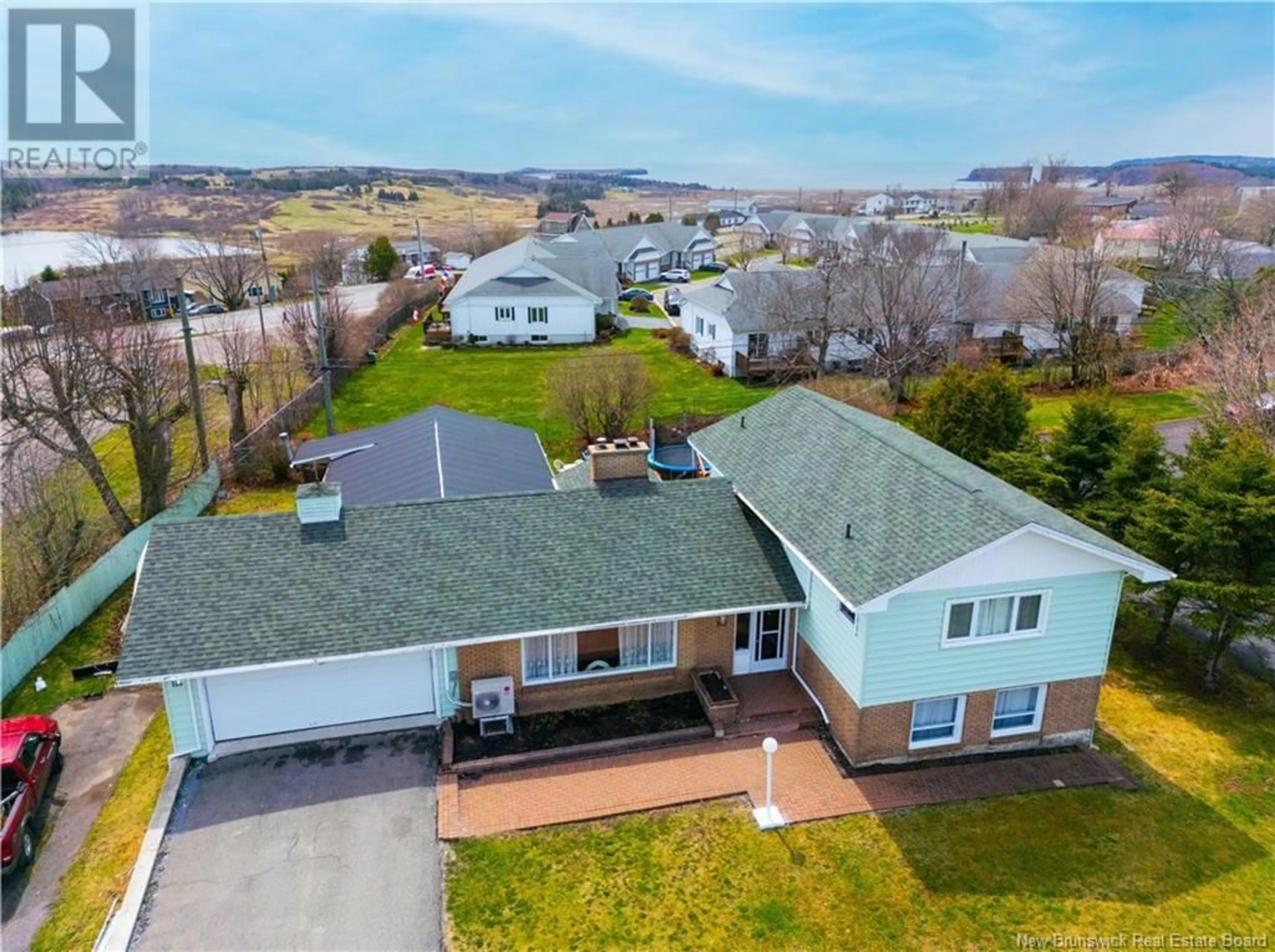 A pic from outside/outdoor area/front of a property/back of a property/a pic from drone, unknown for 113 HORSLER DRIVE, Saint John New Brunswick E2M4B4