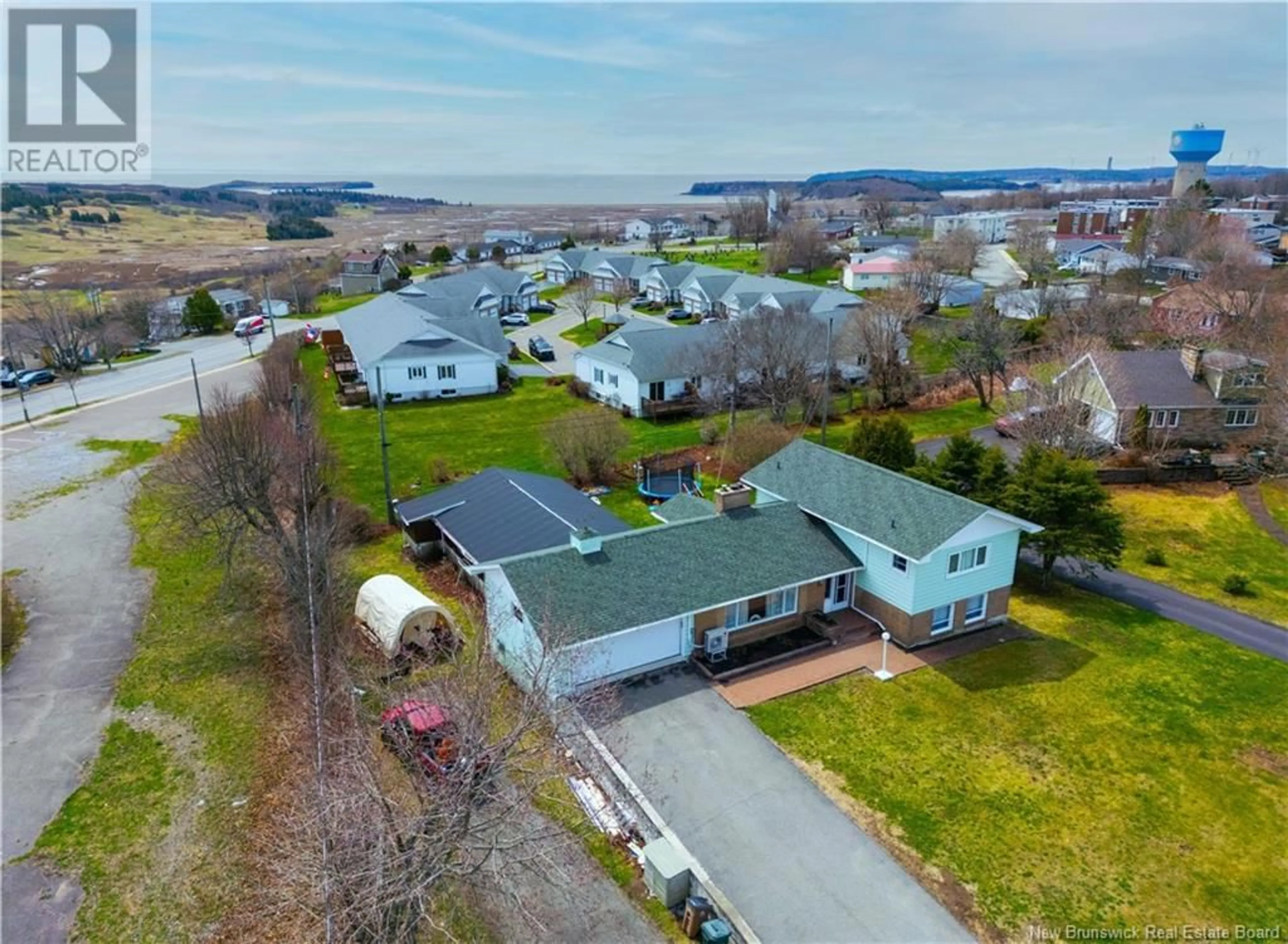 A pic from outside/outdoor area/front of a property/back of a property/a pic from drone, water/lake/river/ocean view for 113 HORSLER DRIVE, Saint John New Brunswick E2M4B4