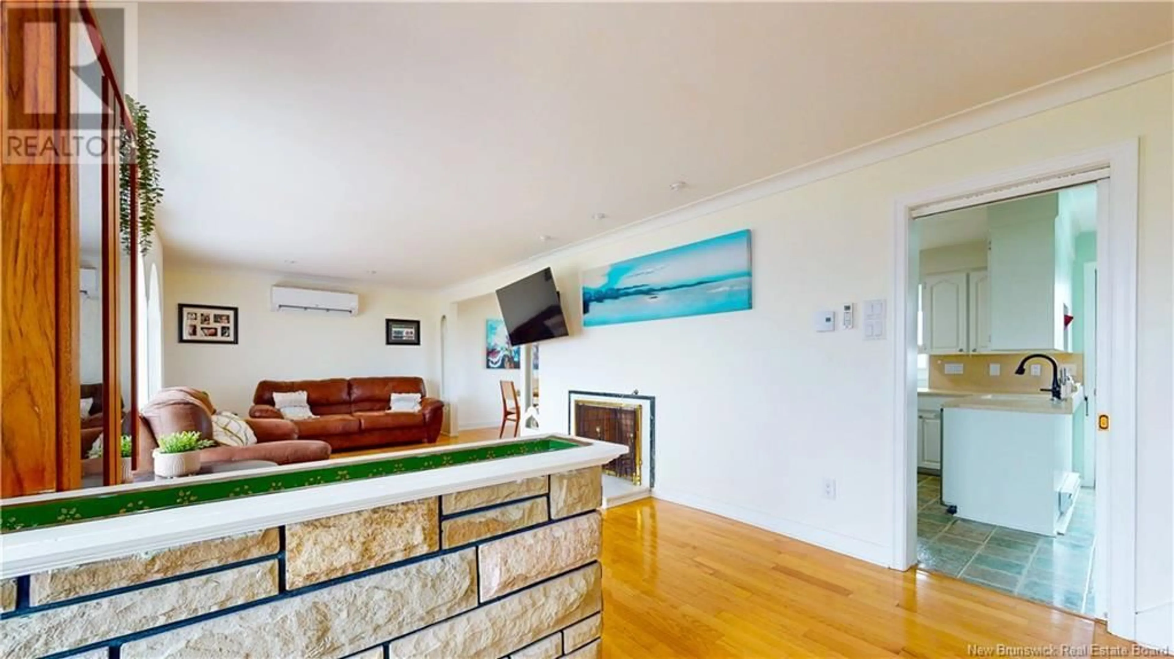 Living room with furniture, wood/laminate floor for 113 HORSLER DRIVE, Saint John New Brunswick E2M4B4