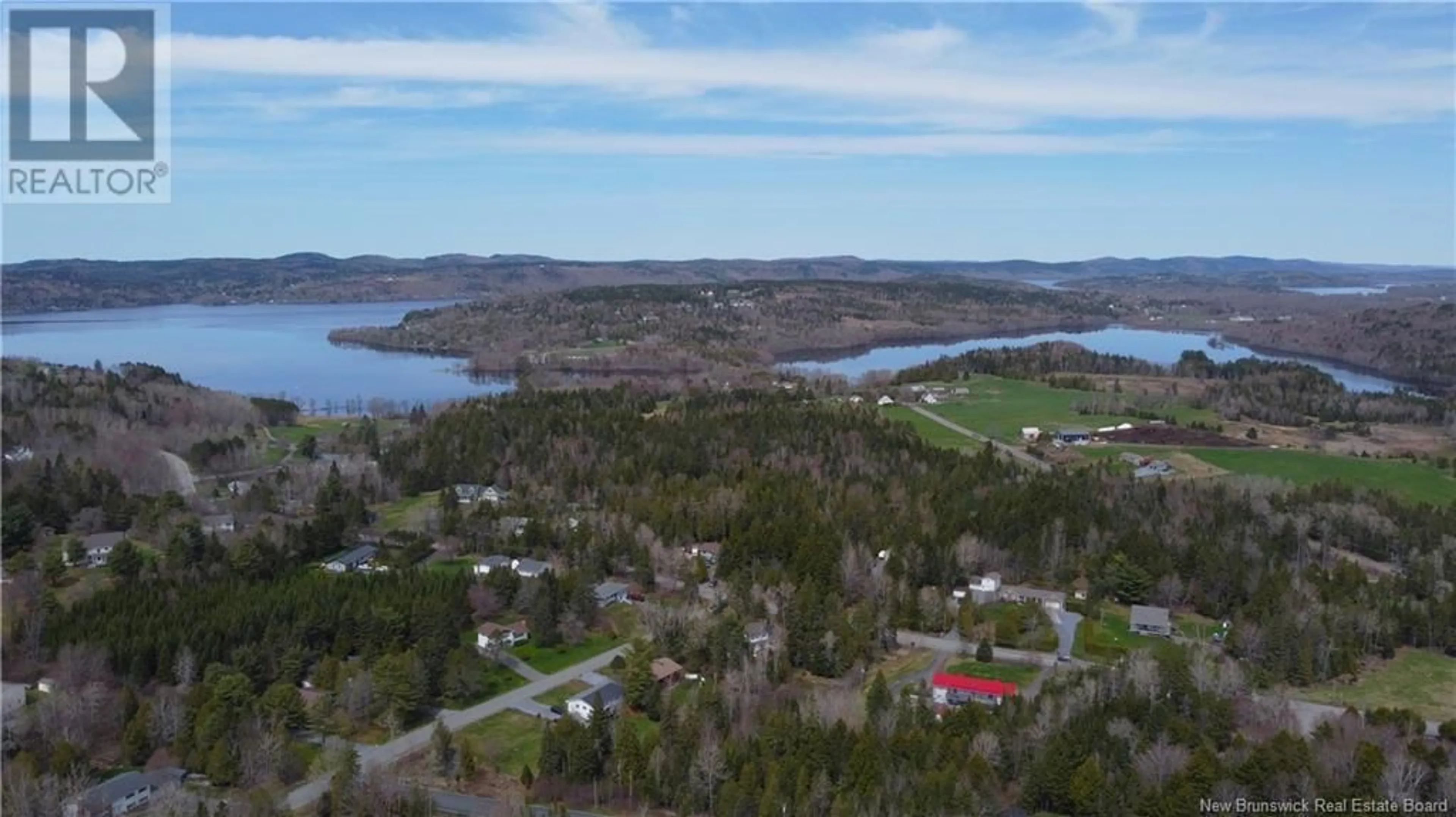 A pic from outside/outdoor area/front of a property/back of a property/a pic from drone, water/lake/river/ocean view for 7 RYNLON CRESCENT, Quispamsis New Brunswick E2G1A5