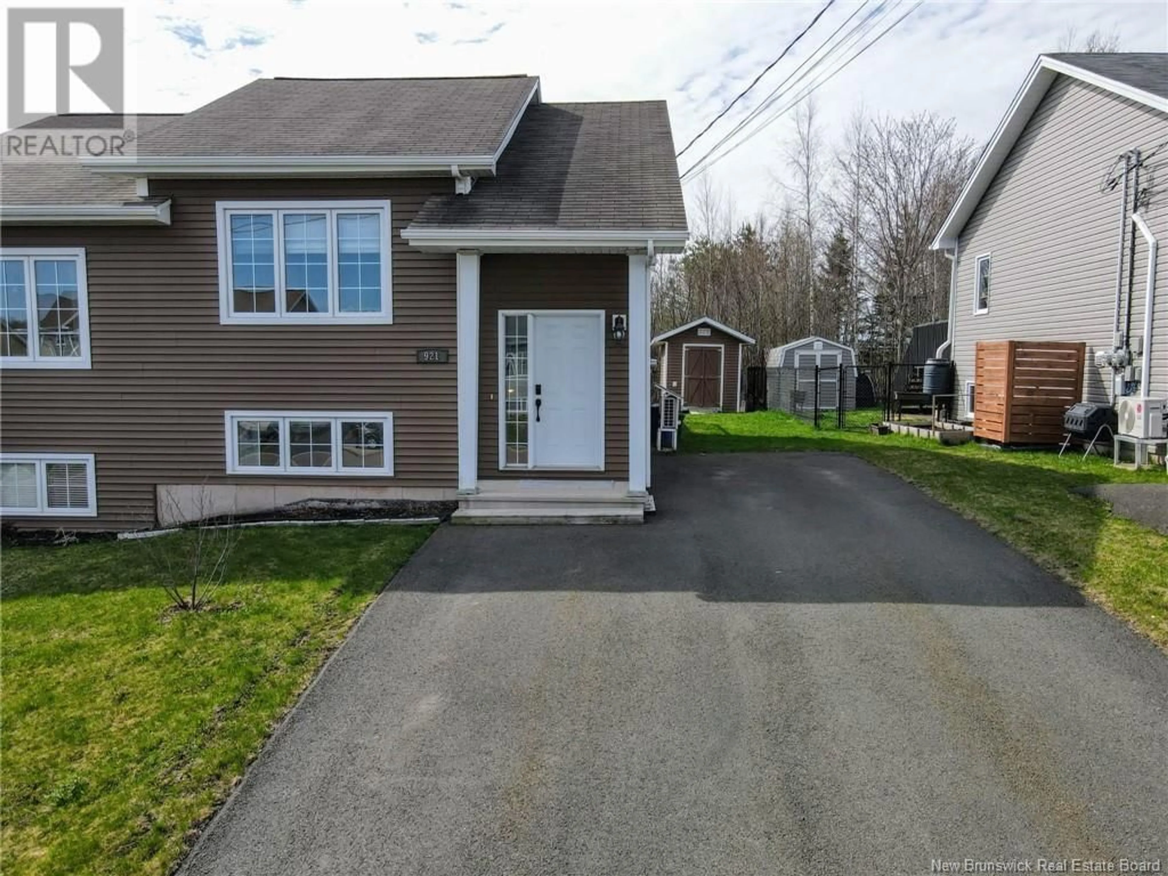 Home with vinyl exterior material, street for 921 BERNARD STREET, Dieppe New Brunswick E1A4A6