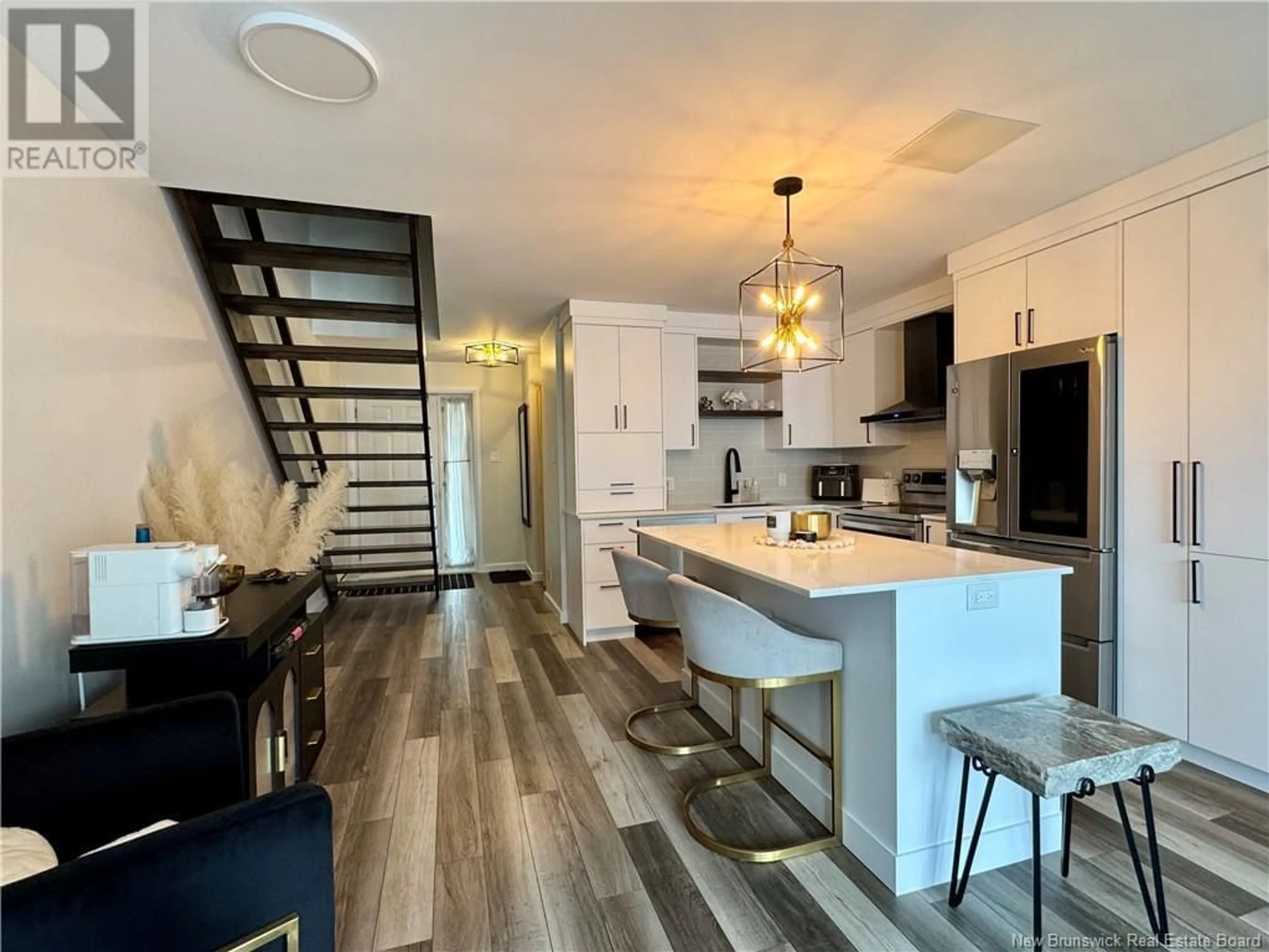 Open concept kitchen, wood/laminate floor for 20D DU BOURG AVENUE, Edmundston New Brunswick E3V4C5