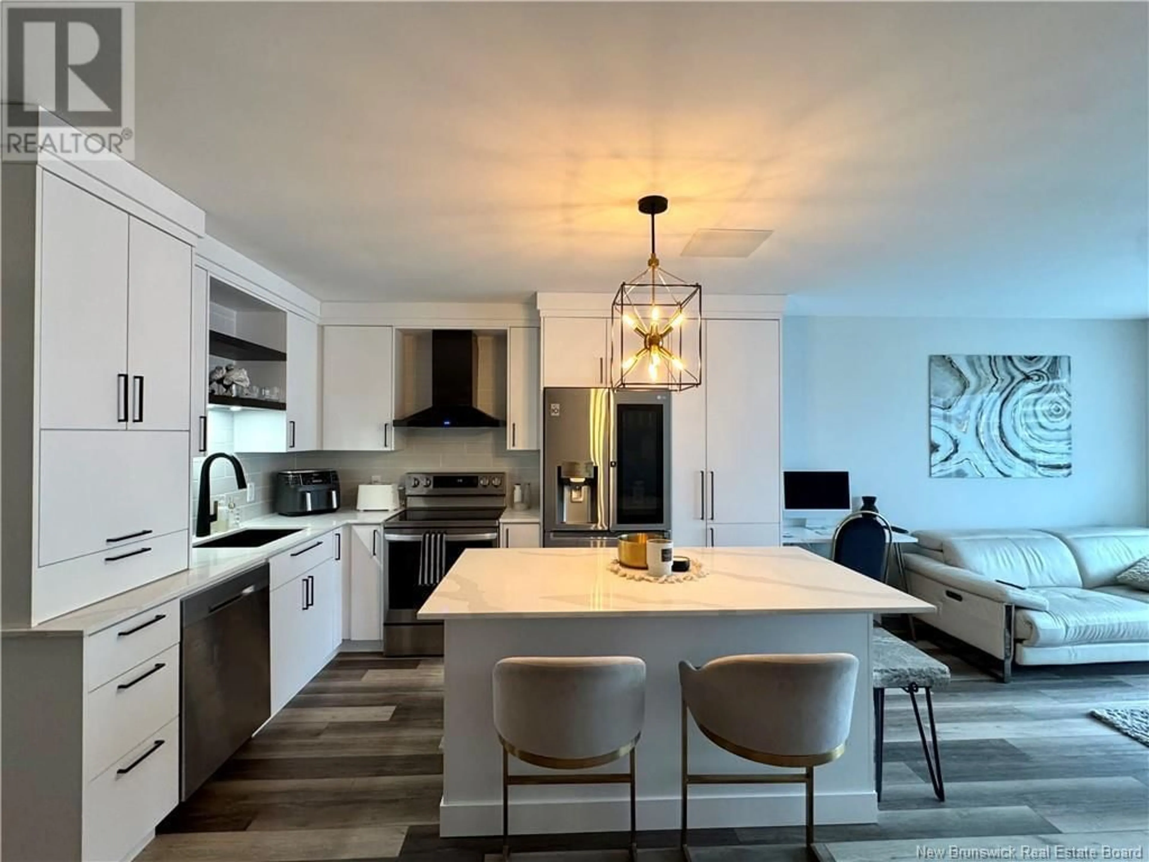 Open concept kitchen, ceramic/tile floor for 20D DU BOURG AVENUE, Edmundston New Brunswick E3V4C5