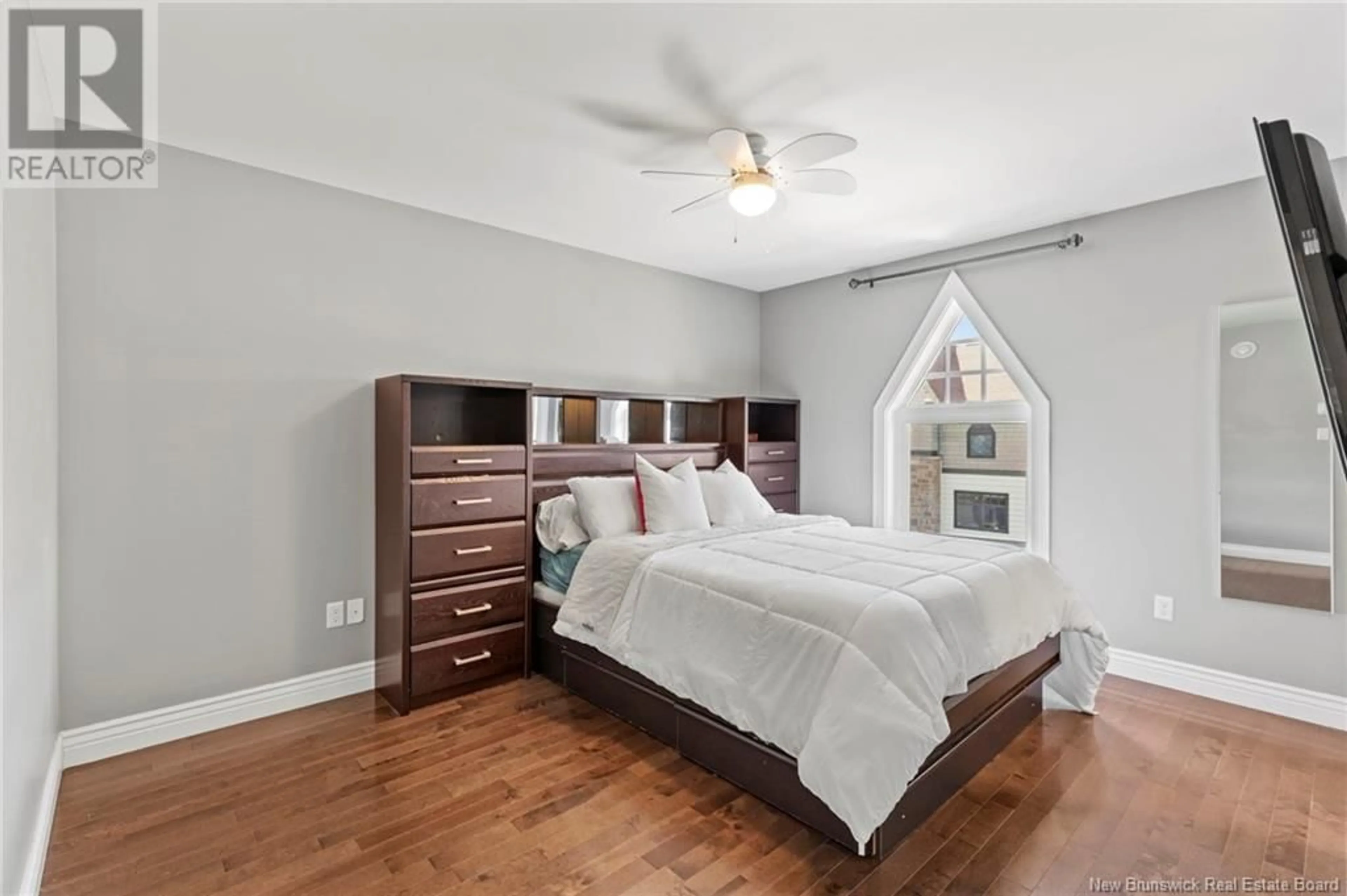 Bedroom with bed, wood/laminate floor for 48 BROWNSTONE LANE, Fredericton New Brunswick E3A9G3