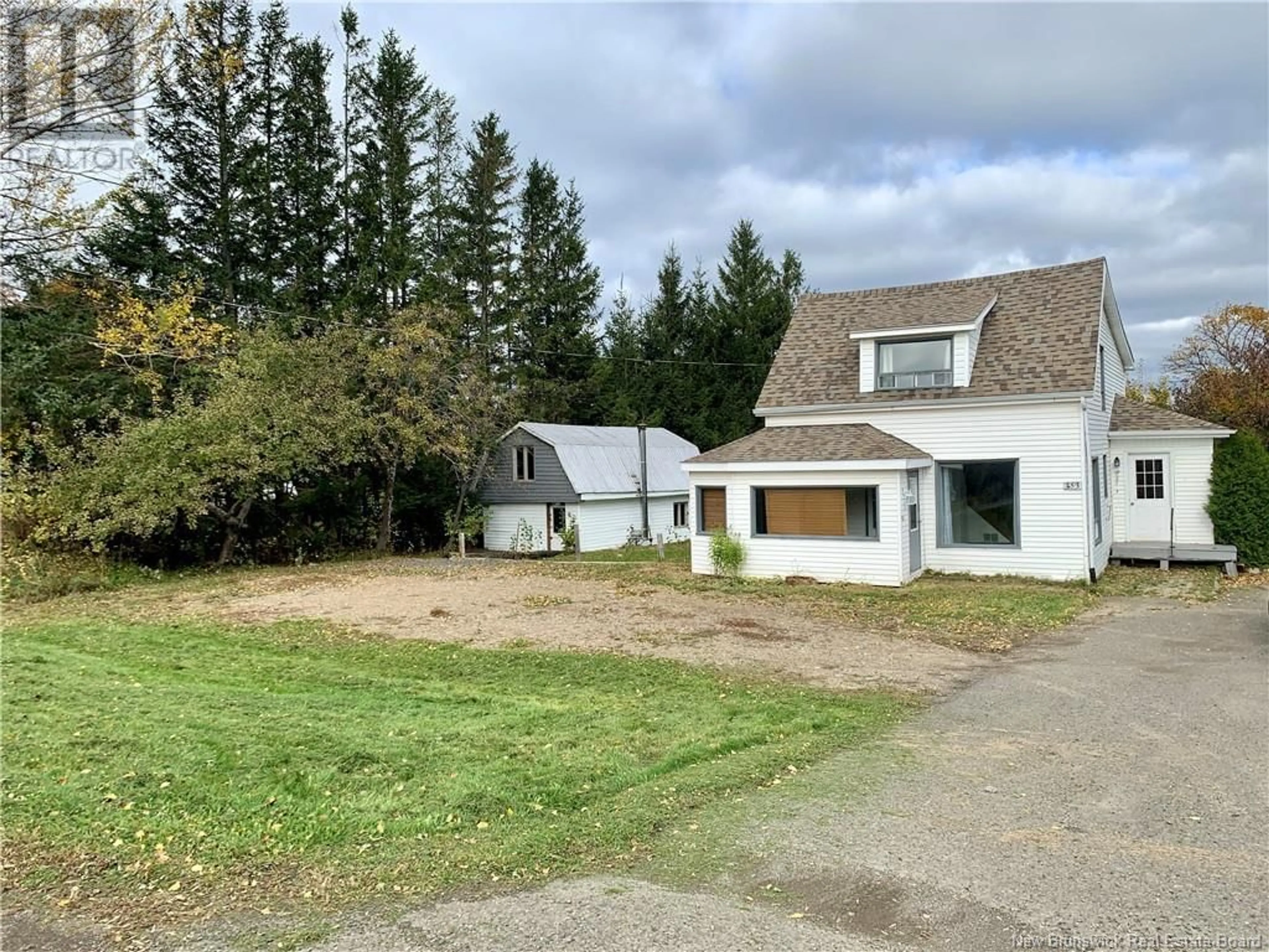 A pic from outside/outdoor area/front of a property/back of a property/a pic from drone, street for 453 CHALEUR, Charlo New Brunswick E8E2B9