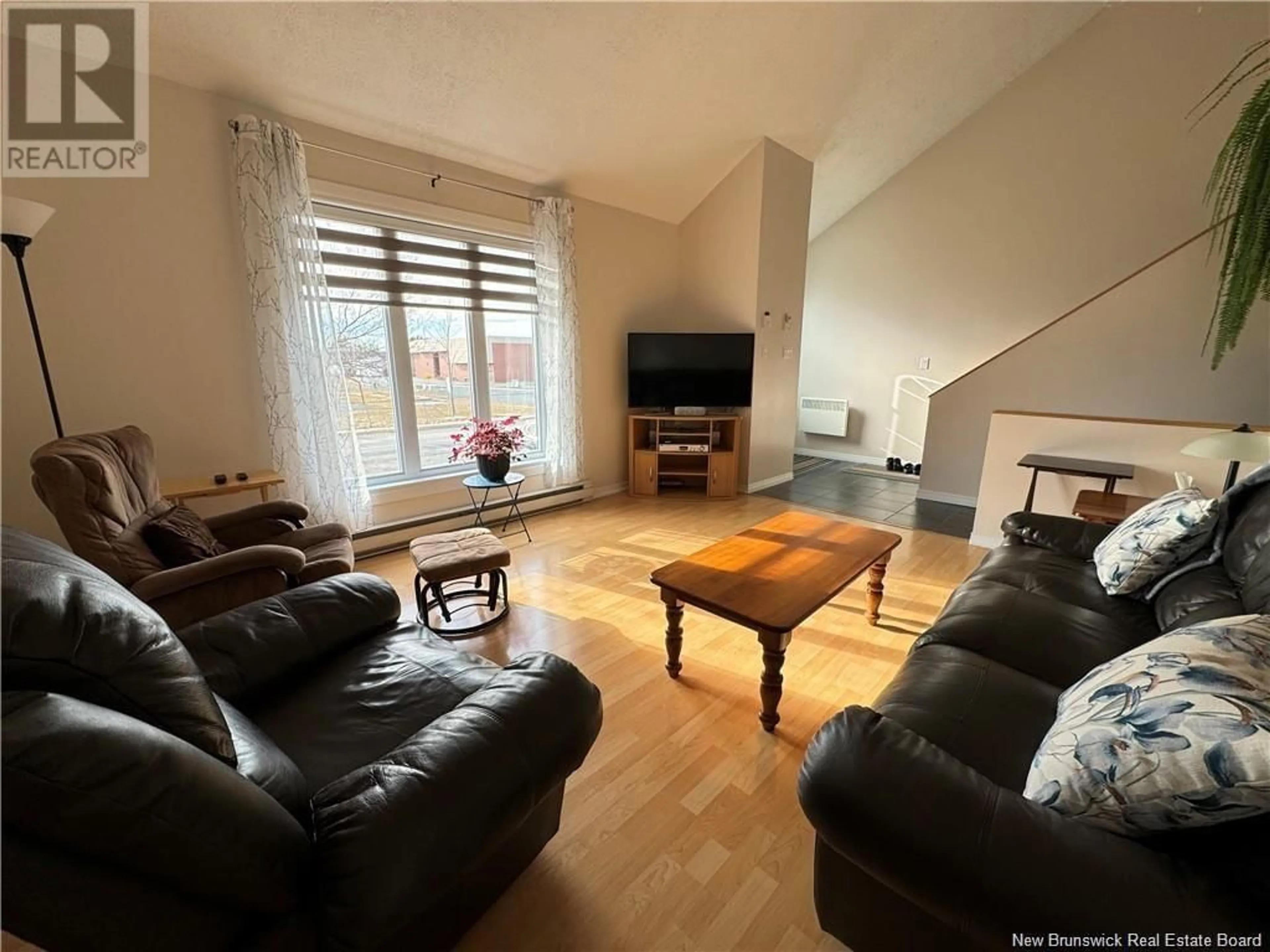Living room with furniture, unknown for 24 RUE DESCHÊNES, Saint-Quentin New Brunswick E8A1M1