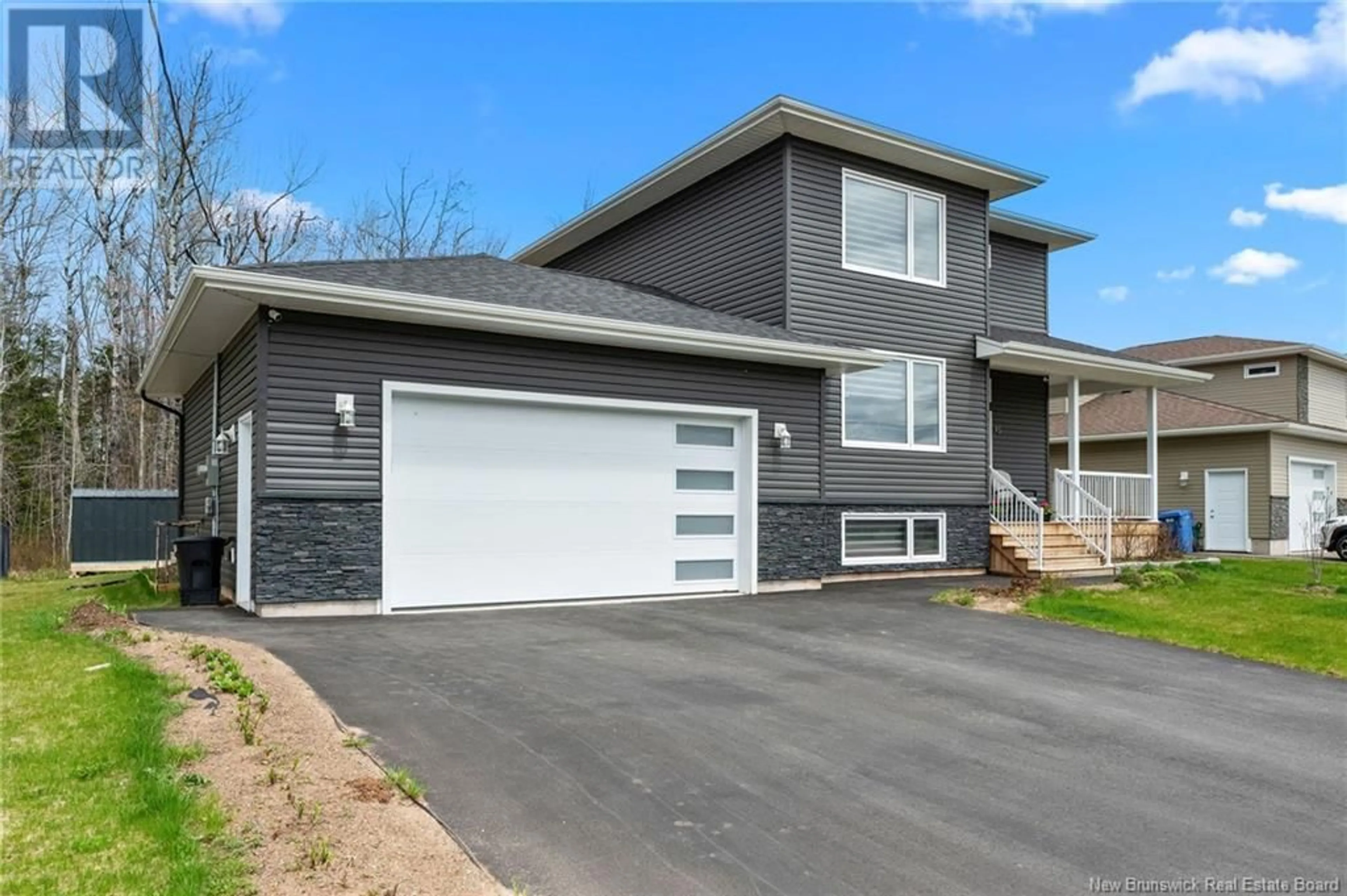 Home with vinyl exterior material, street for 95 SATARA DRIVE, Moncton New Brunswick E1G6A5