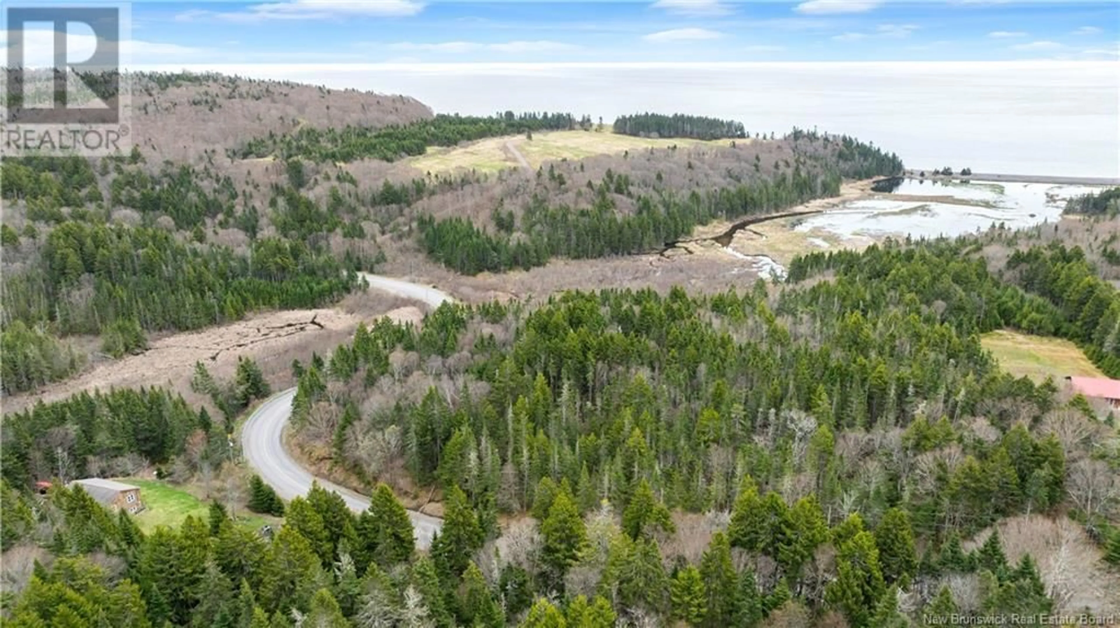 A pic from outside/outdoor area/front of a property/back of a property/a pic from drone, forest/trees view for 35 LITTLE BEACH ROAD, Bay View New Brunswick E5R1M1