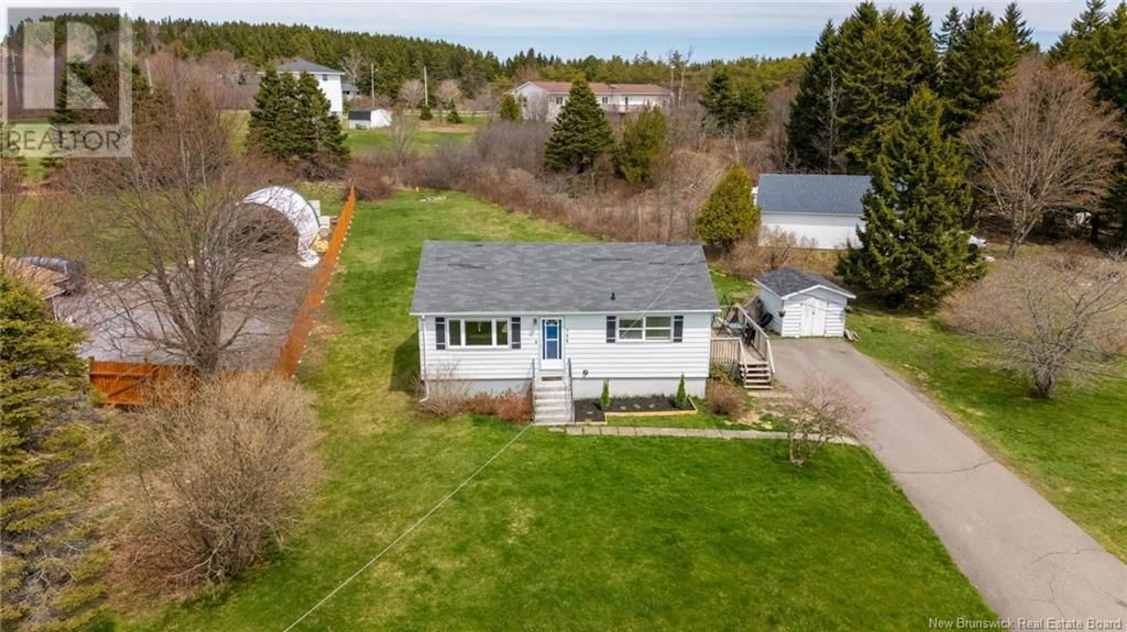 A pic from outside/outdoor area/front of a property/back of a property/a pic from drone, street for 799 OLD BLACK RIVER ROAD, Saint John New Brunswick E2J4S9