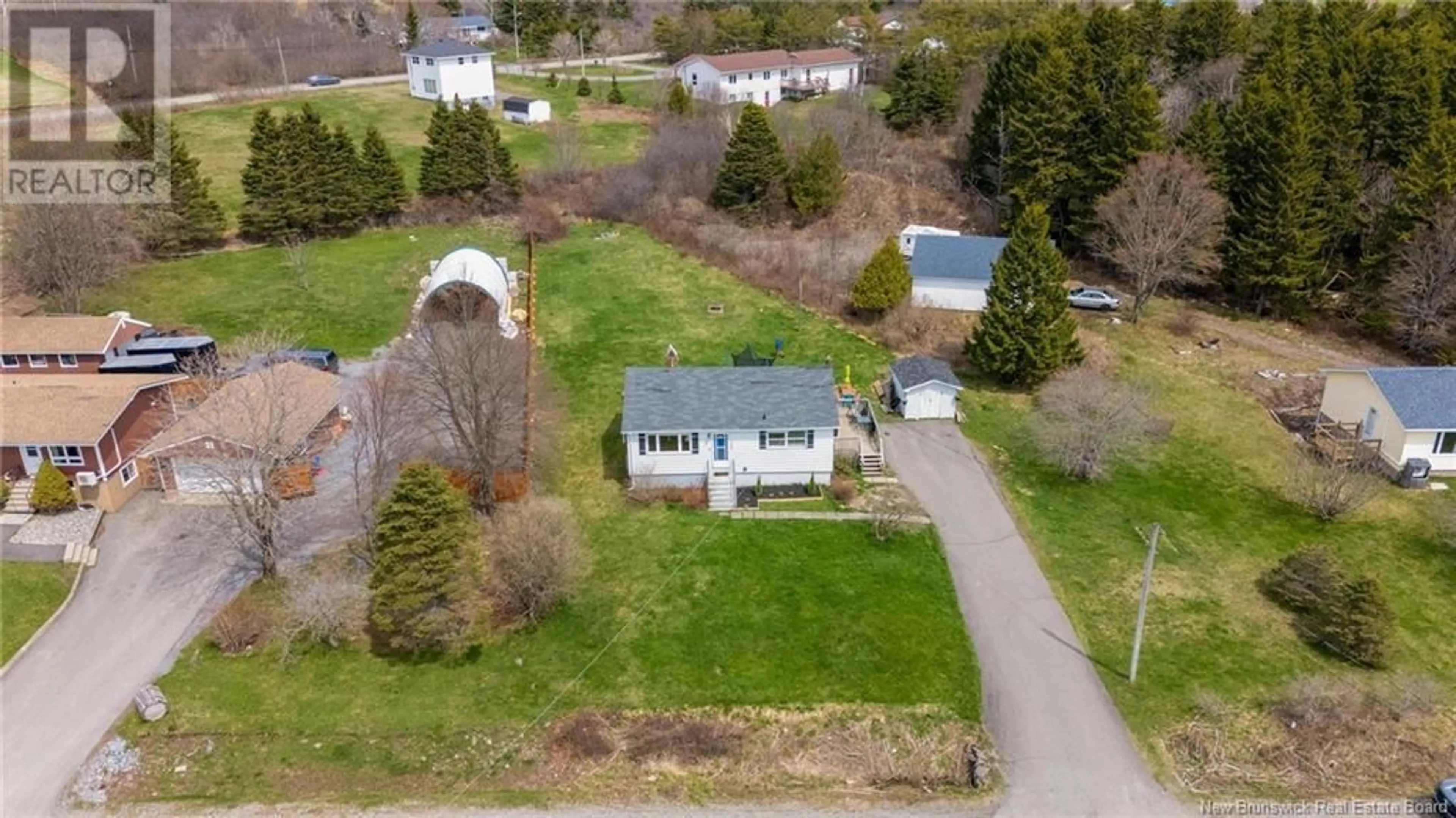 A pic from outside/outdoor area/front of a property/back of a property/a pic from drone, street for 799 OLD BLACK RIVER ROAD, Saint John New Brunswick E2J4S9