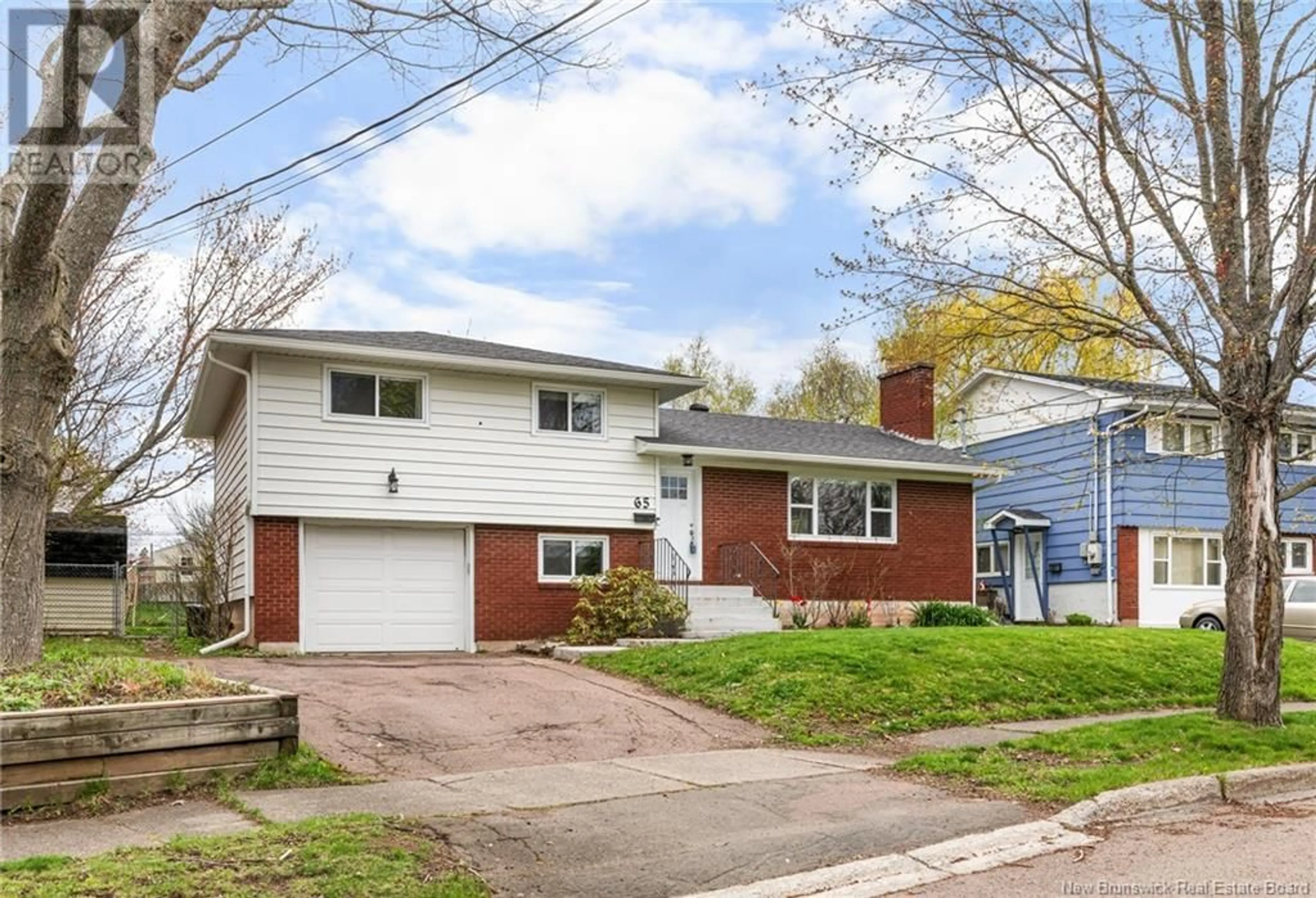 Home with vinyl exterior material, street for 65 MADISON AVENUE, Moncton New Brunswick E1E1R5