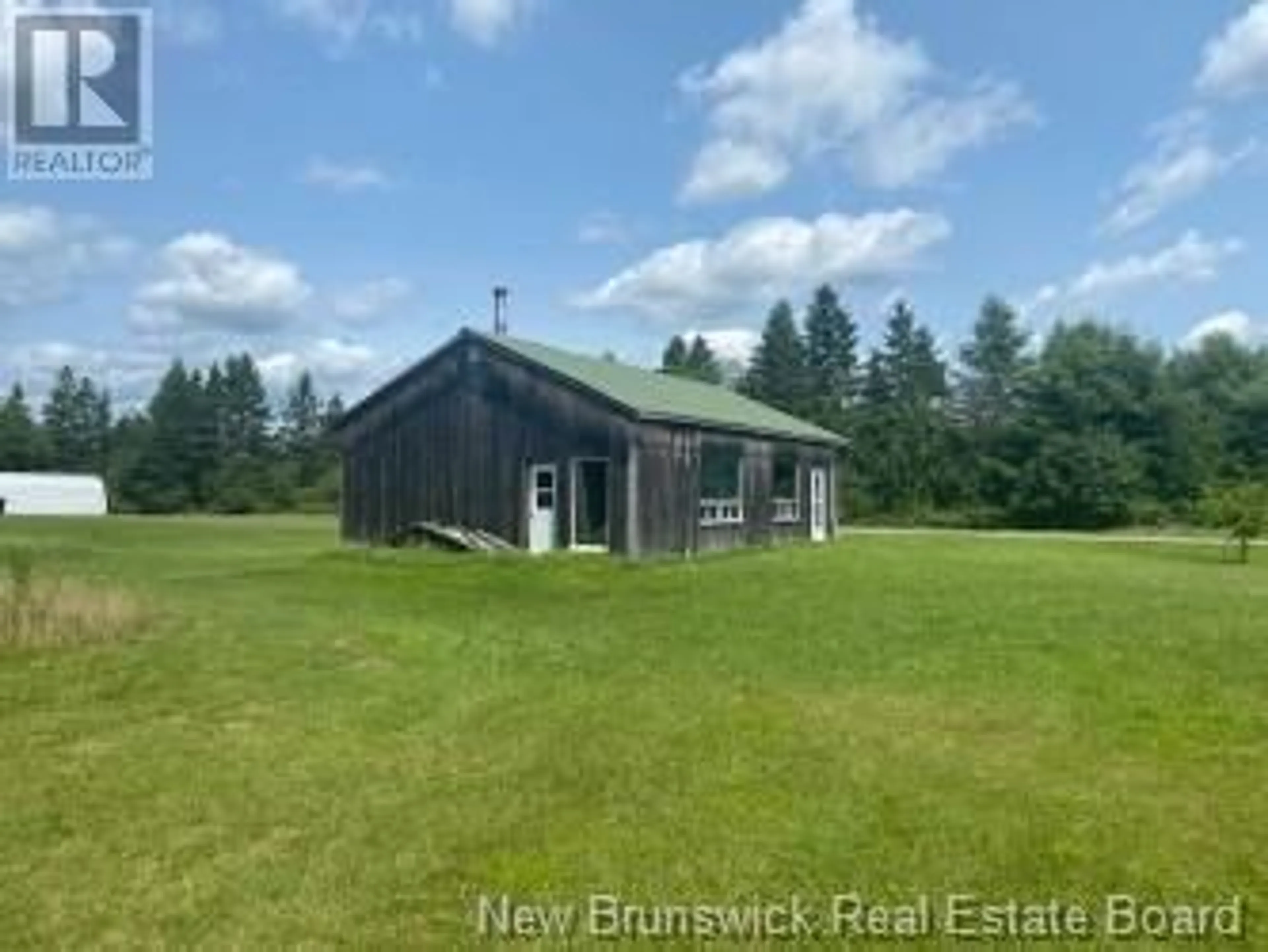 A pic from outside/outdoor area/front of a property/back of a property/a pic from drone, water/lake/river/ocean view for 268 DEBEC ROAD, Debec New Brunswick E7N2B8