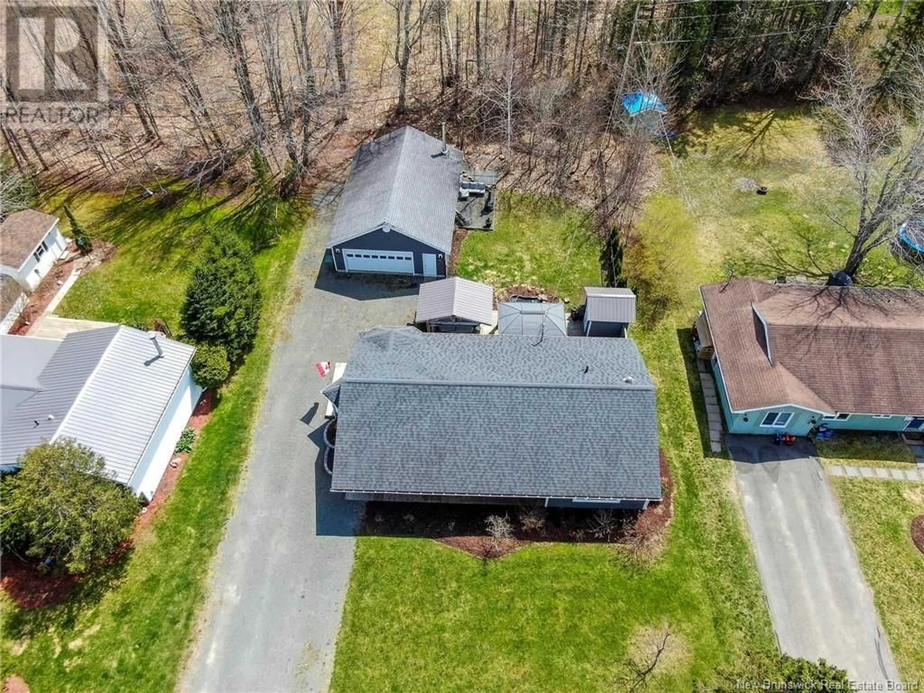A pic from outside/outdoor area/front of a property/back of a property/a pic from drone, unknown for 110 TIMOTHY DRIVE, New Maryland New Brunswick E3C1G1