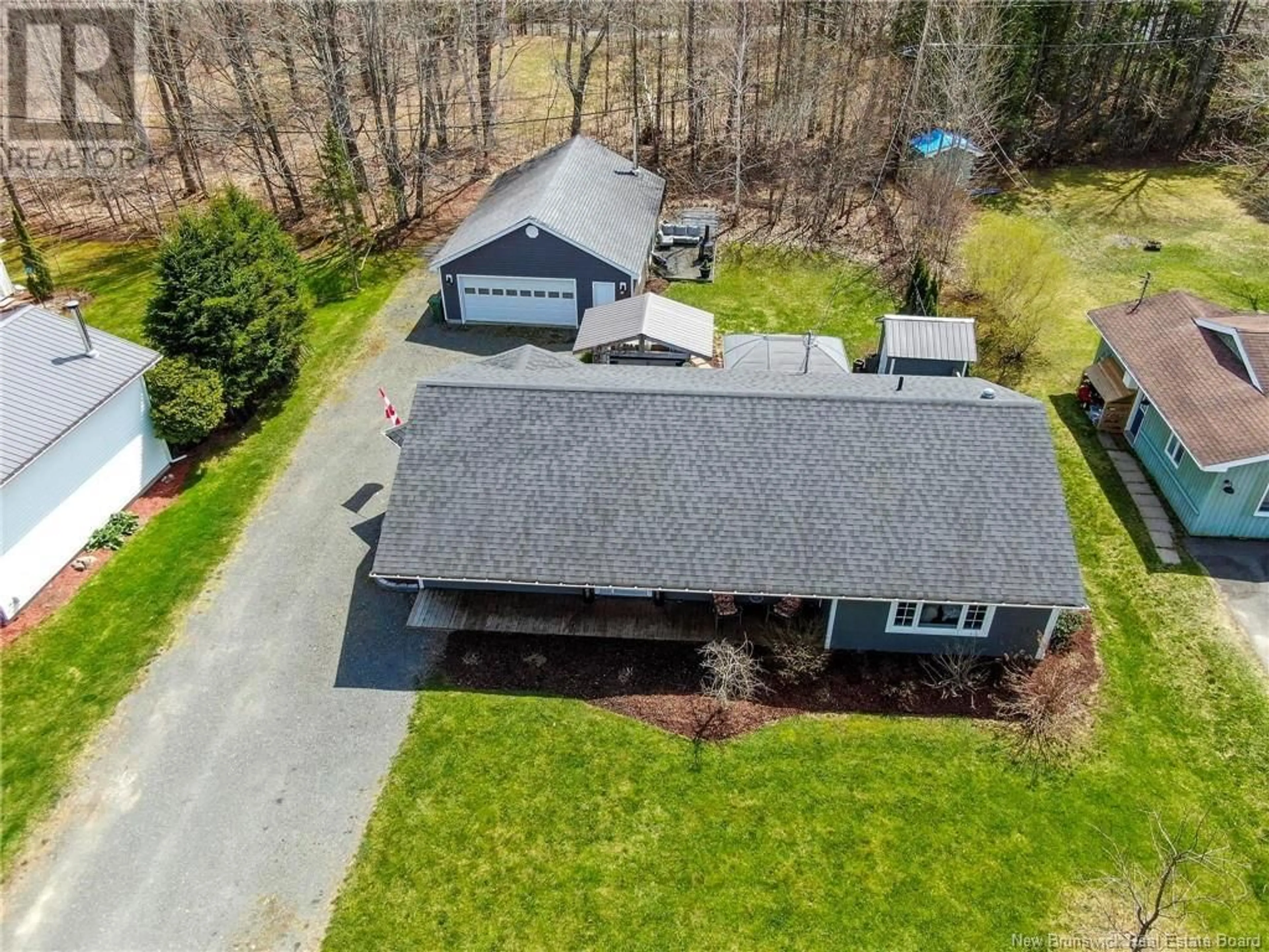 A pic from outside/outdoor area/front of a property/back of a property/a pic from drone, street for 110 TIMOTHY DRIVE, New Maryland New Brunswick E3C1G1