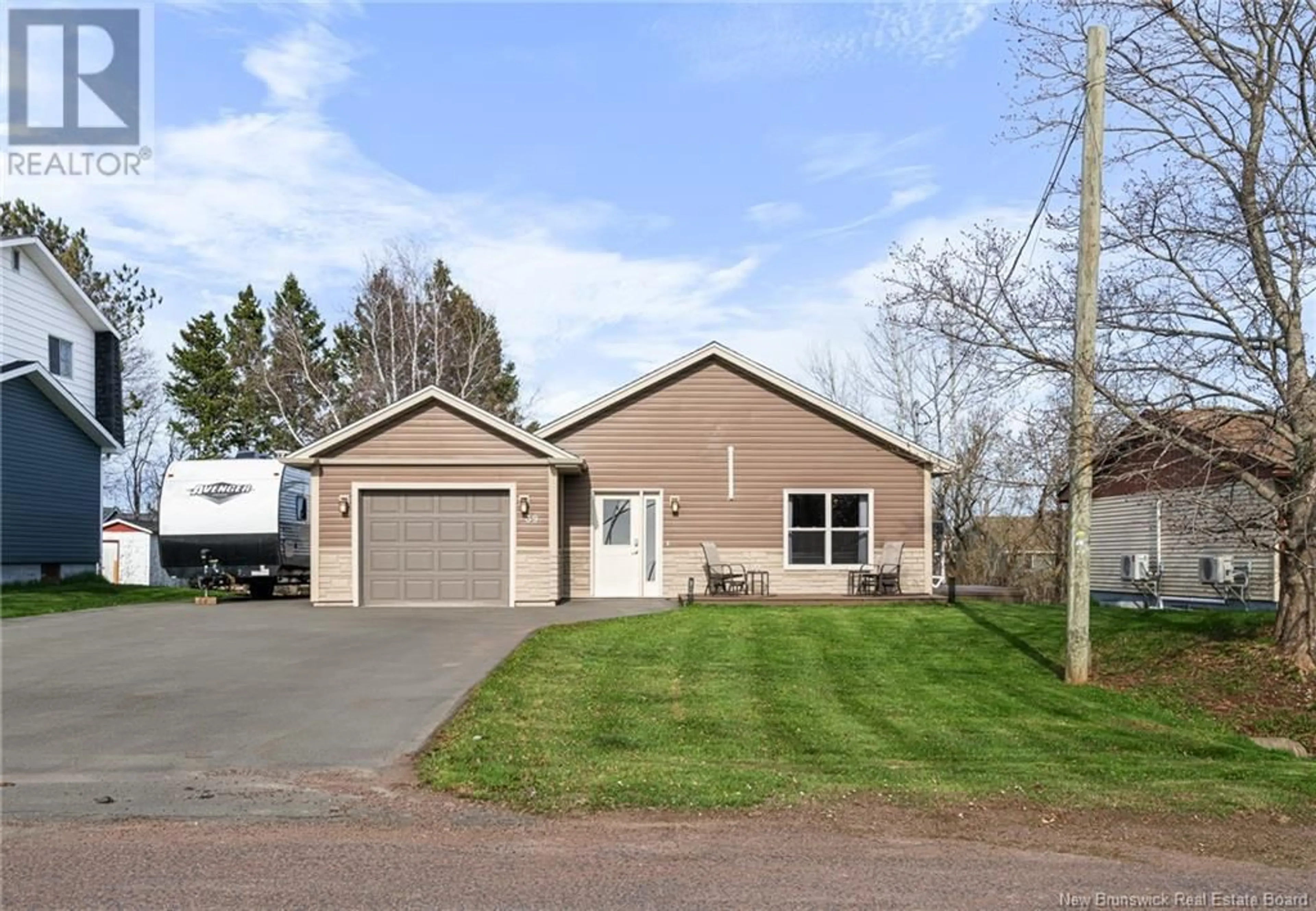 Home with vinyl exterior material, street for 39 FOREST STREET, Cap-Pelé New Brunswick E4N1T2