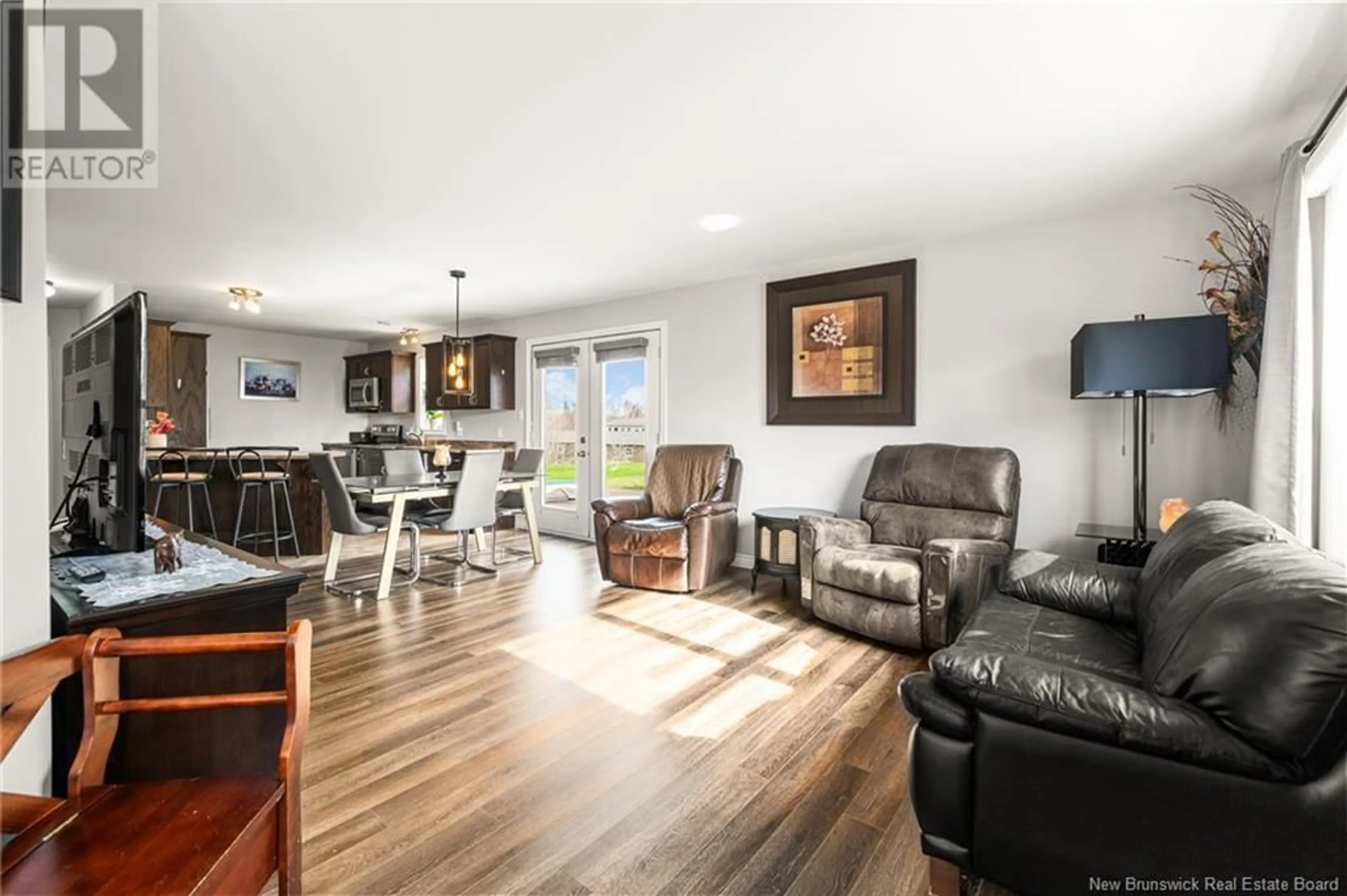 Living room with furniture, wood/laminate floor for 39 FOREST STREET, Cap-Pelé New Brunswick E4N1T2