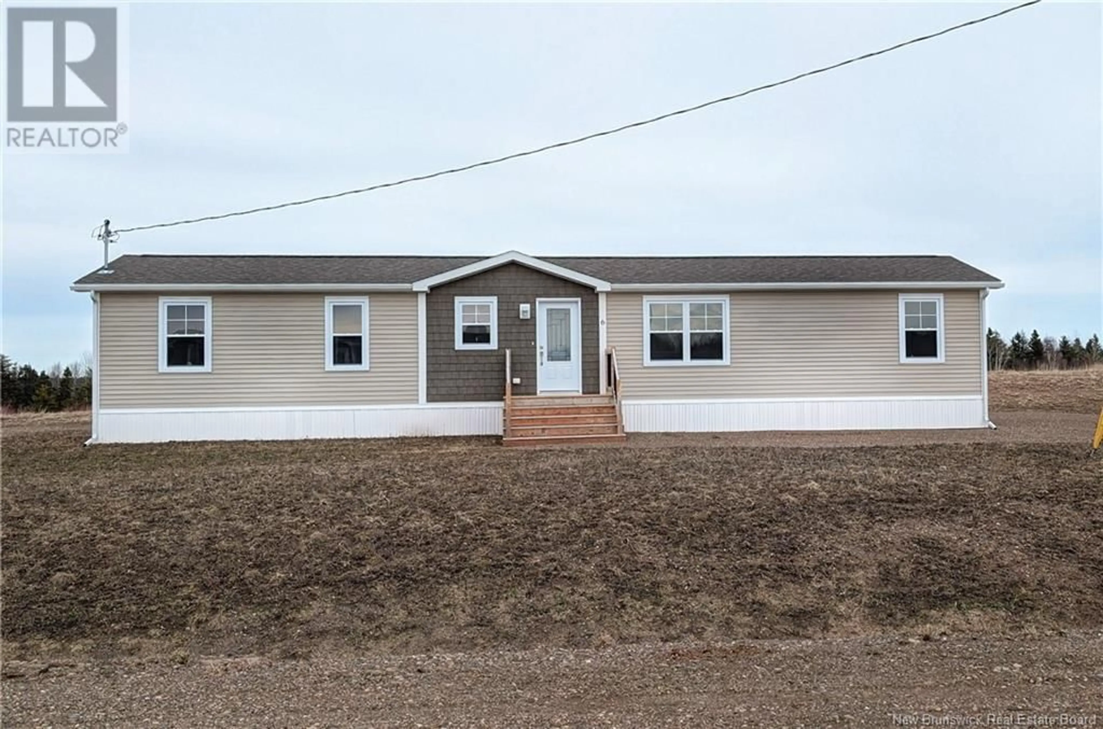 Home with vinyl exterior material, building for 6 CHRISTINE/MARTIN STREET, Saint-Isidore New Brunswick E8M0B3