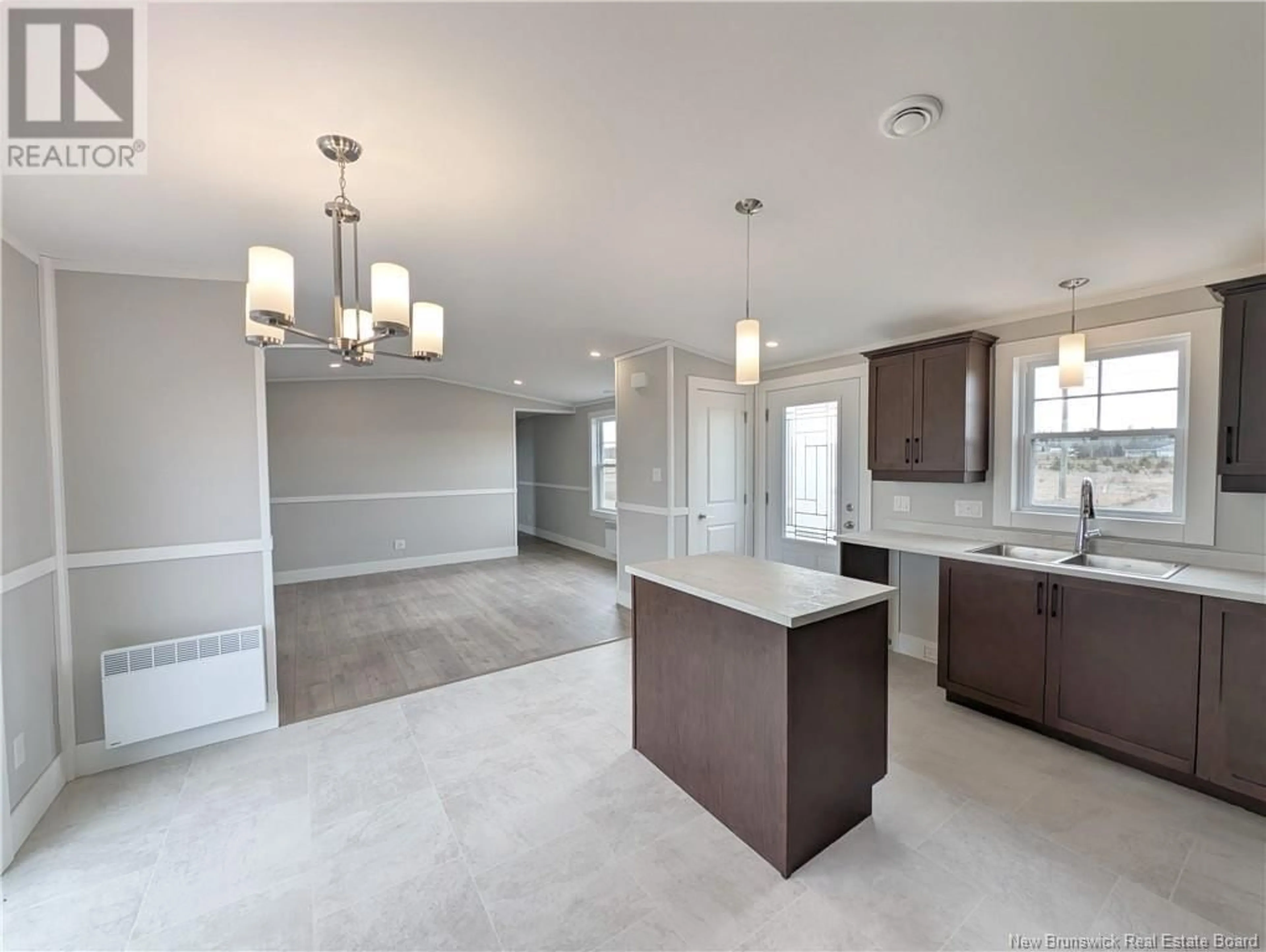 Open concept kitchen, ceramic/tile floor for 6 CHRISTINE/MARTIN STREET, Saint-Isidore New Brunswick E8M0B3