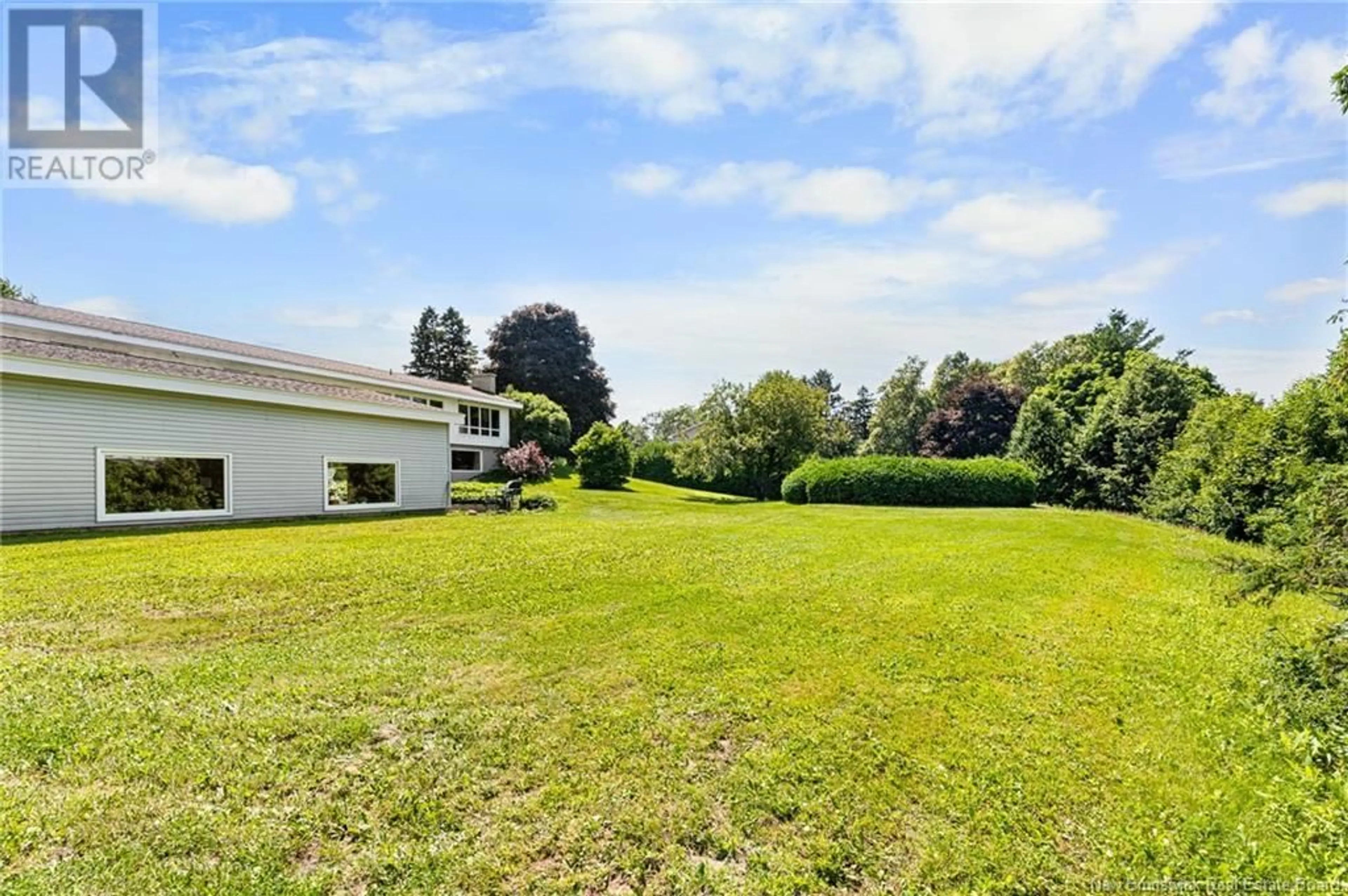 A pic from outside/outdoor area/front of a property/back of a property/a pic from drone, unknown for 8 FAIRWAY BOULEVARD, Riverview New Brunswick E1B1S8